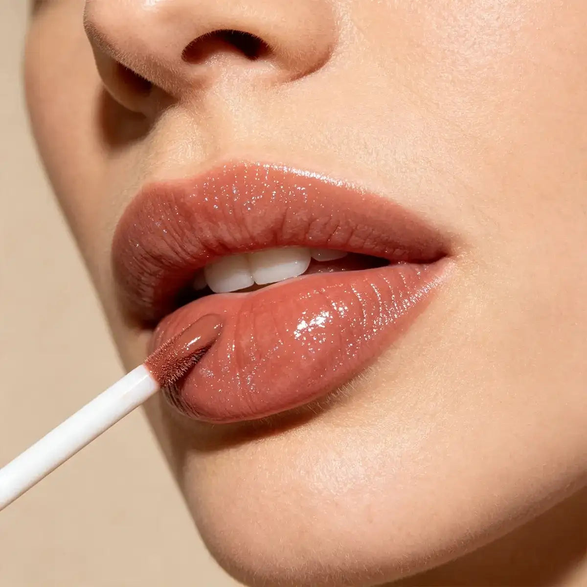 Custom lip gloss applied on lips to evaluate wear, comfort and after-feel