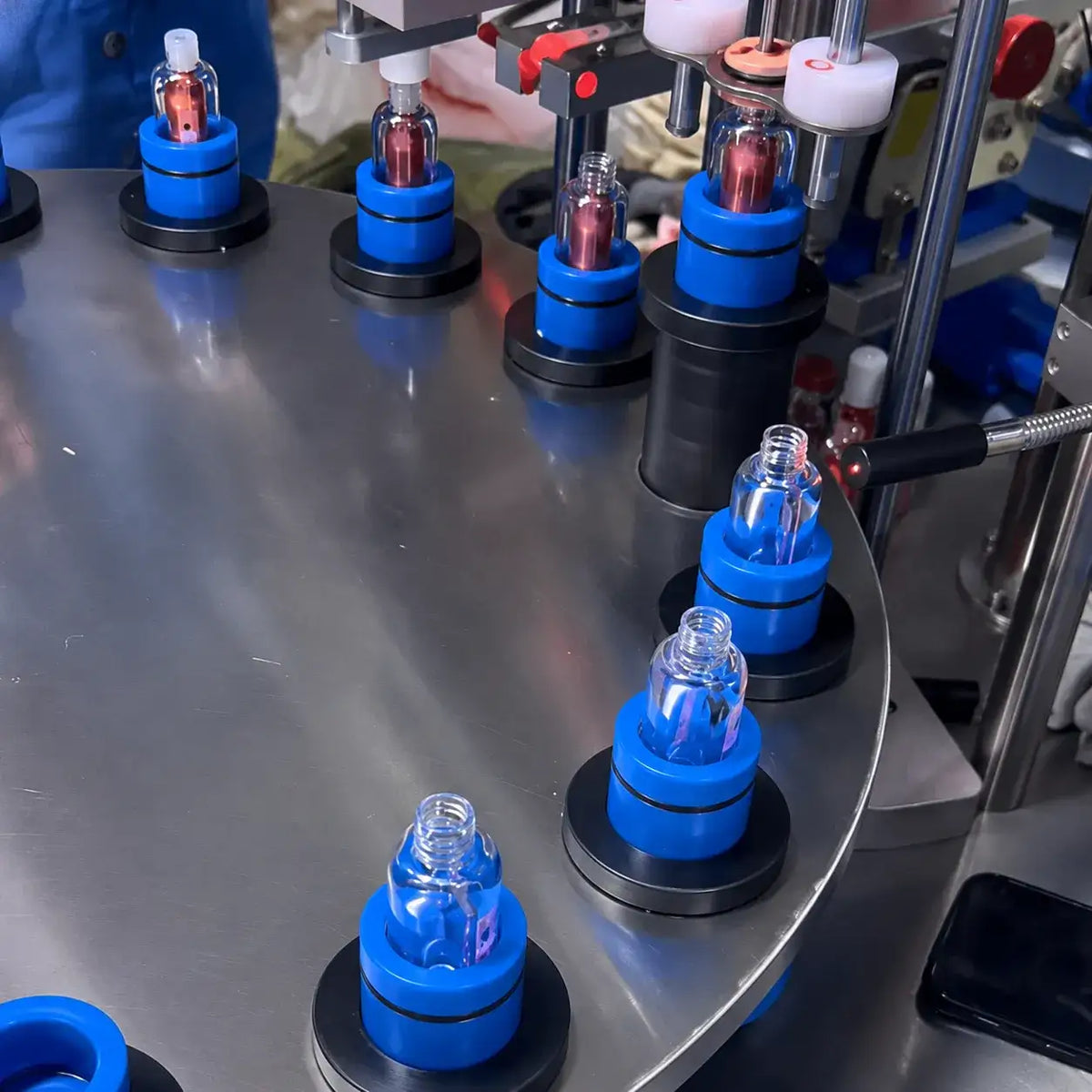 Custom makeup line production process by KAIYA, showing finished makeup filling and assembly support for beauty brands