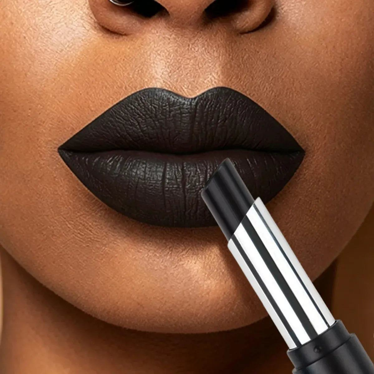 KAIYA black lipstick with opaque coverage and a dramatic matte finish