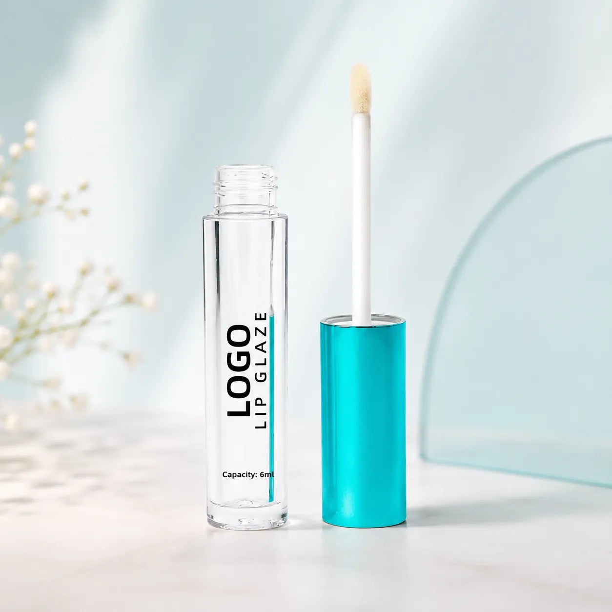 Kaiya blue lip gloss tube with clear bottle and wand applicator packaging.