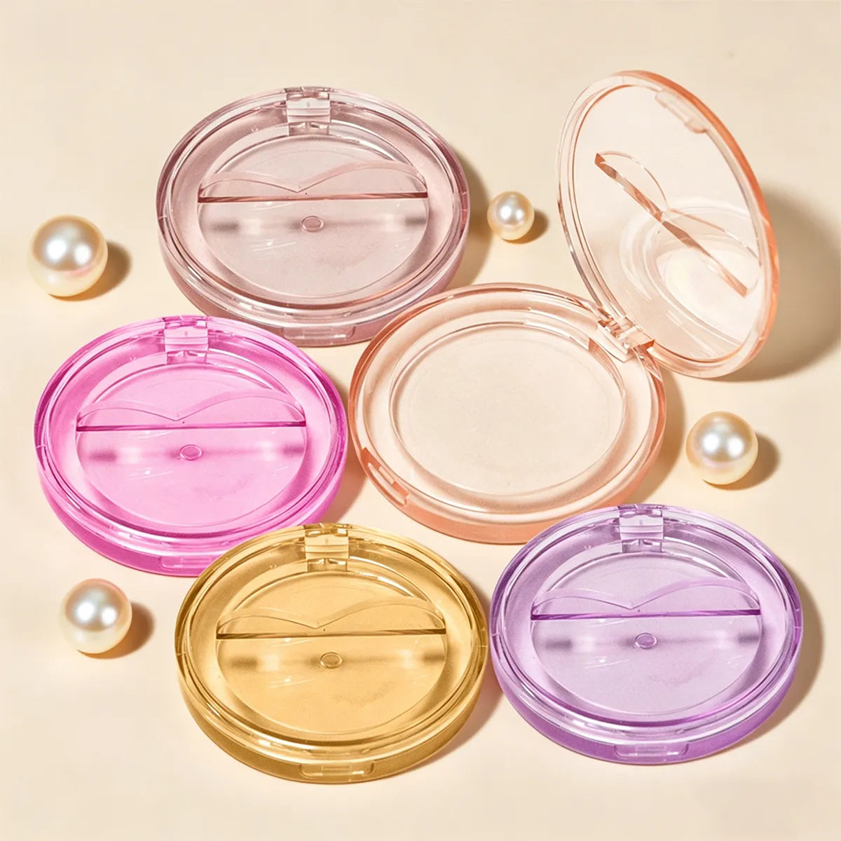 Clear plastic cosmetic containers in round compact design by Kaiya