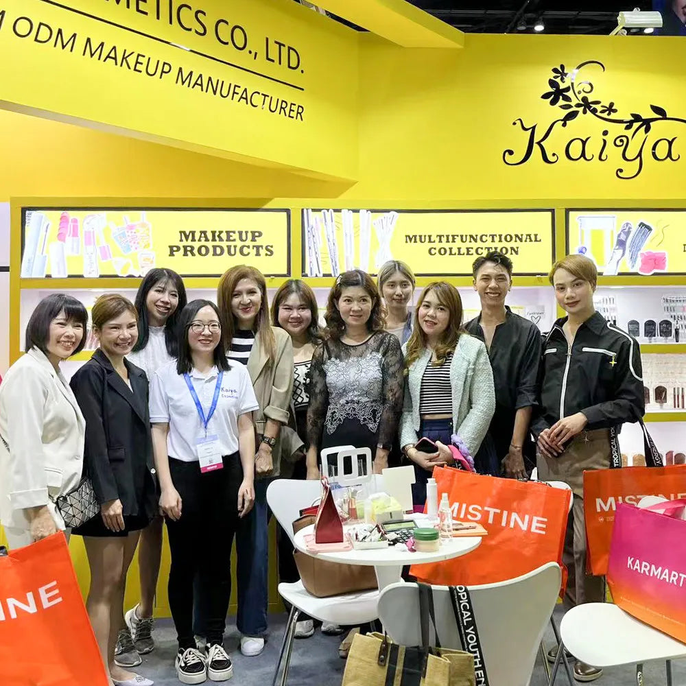 KAIYA team as leading cosmetic wholesale suppliers providing turnkey cosmetics and one stop makeup solutions for global brand partners at a beauty expo.