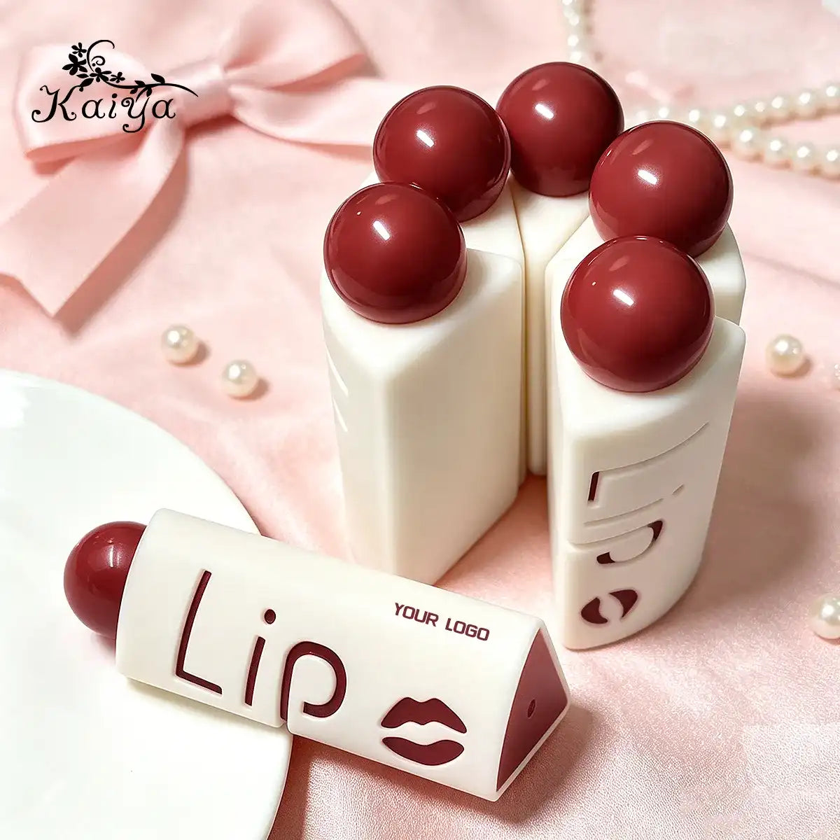 Creative lip gloss tubes with cake-inspired shape and coordinated product display by KAIYA