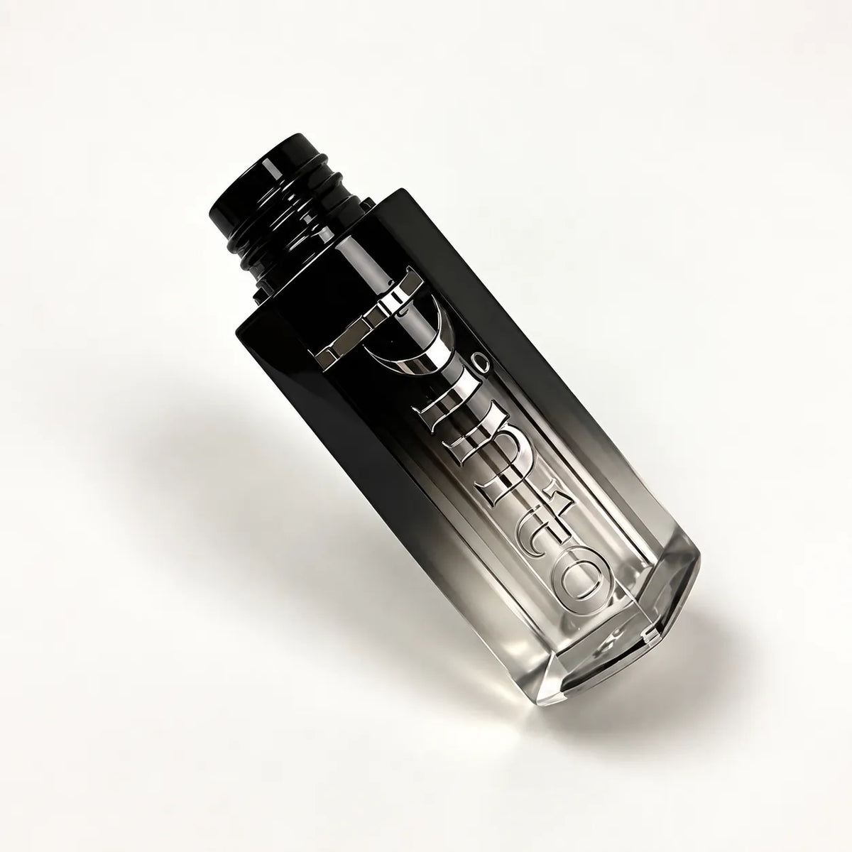 Kaiya custom lip gloss tubes with logo engraving and a black-to-clear gradient finish
