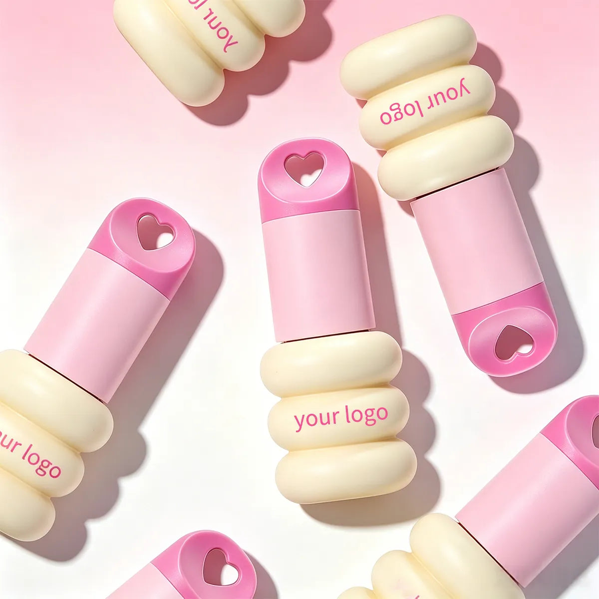 Cute lip gloss bottles with creative shapes and decorative details for custom beauty collections