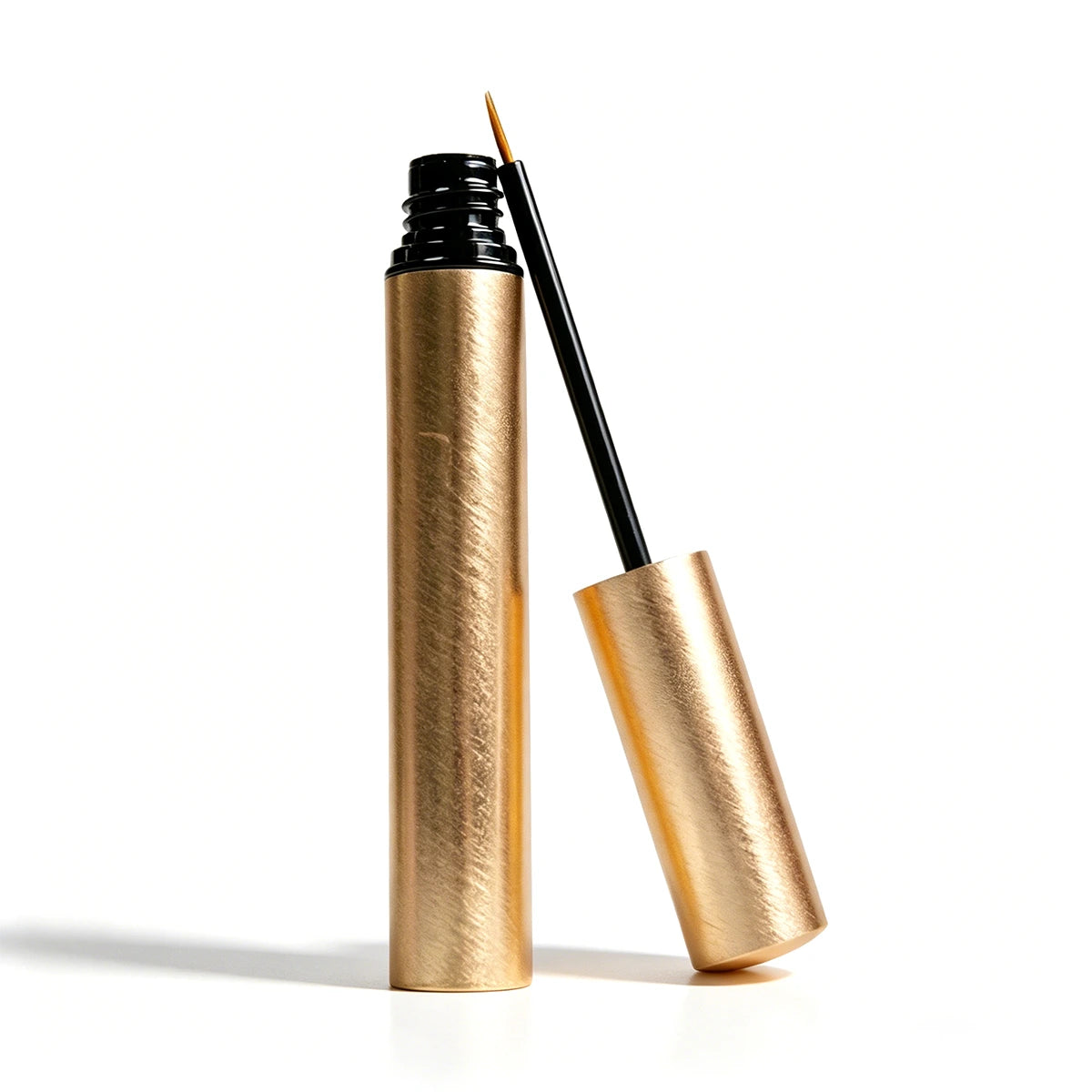 Gold aluminum empty eyeliner containers with slim brush applicator, suitable for custom liquid eyeliner bottle projects and premium eye makeup packaging.