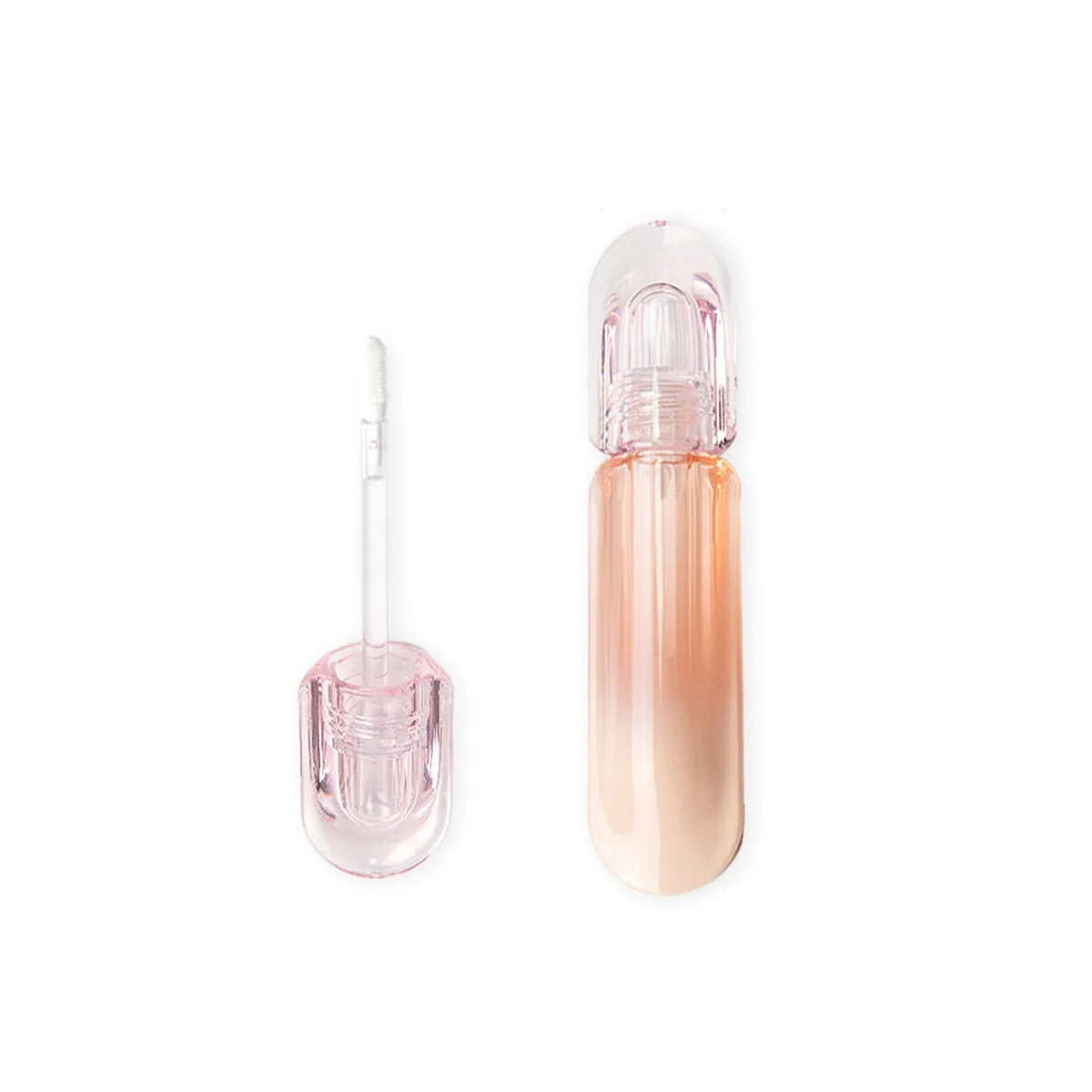 Empty plastic lip gloss tube in pink and gold design by Kaiya
