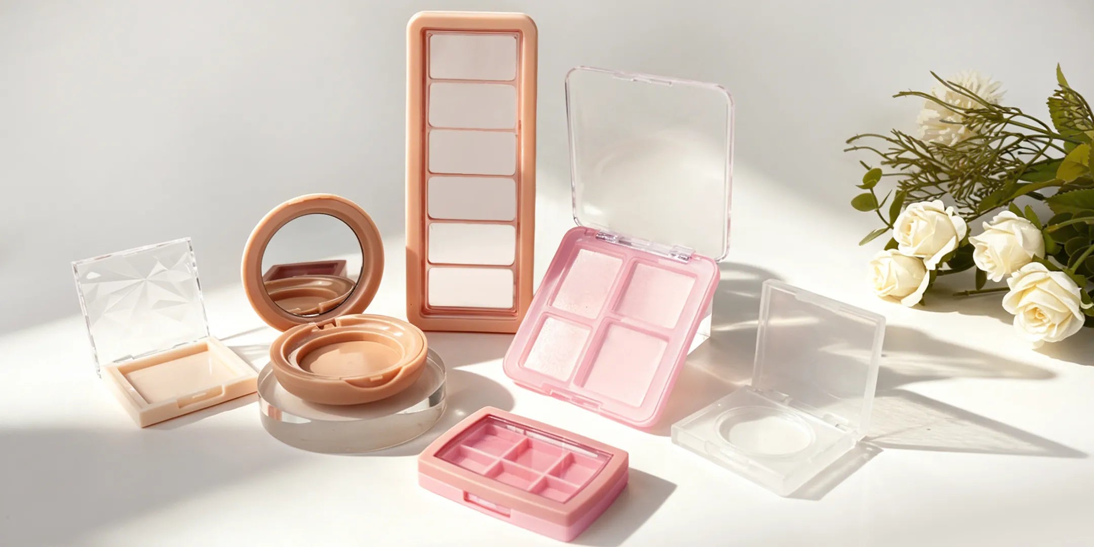 Eyeshadow packaging collection showing various empty eyeshadow palettes from Kaiya