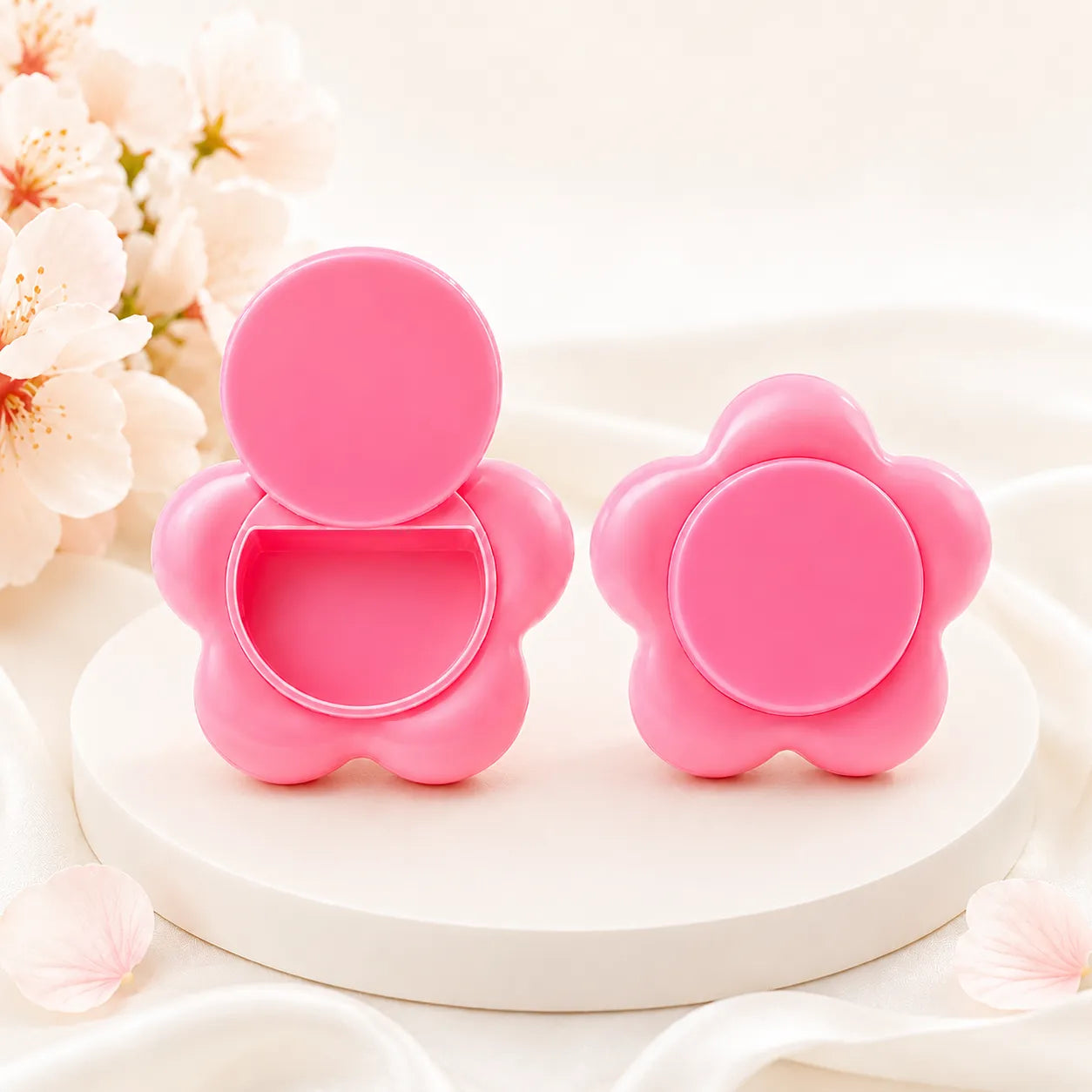 Innovative makeup packaging by KAIYA, featuring a pink flower-shaped compact container in a soft and elegant product display.