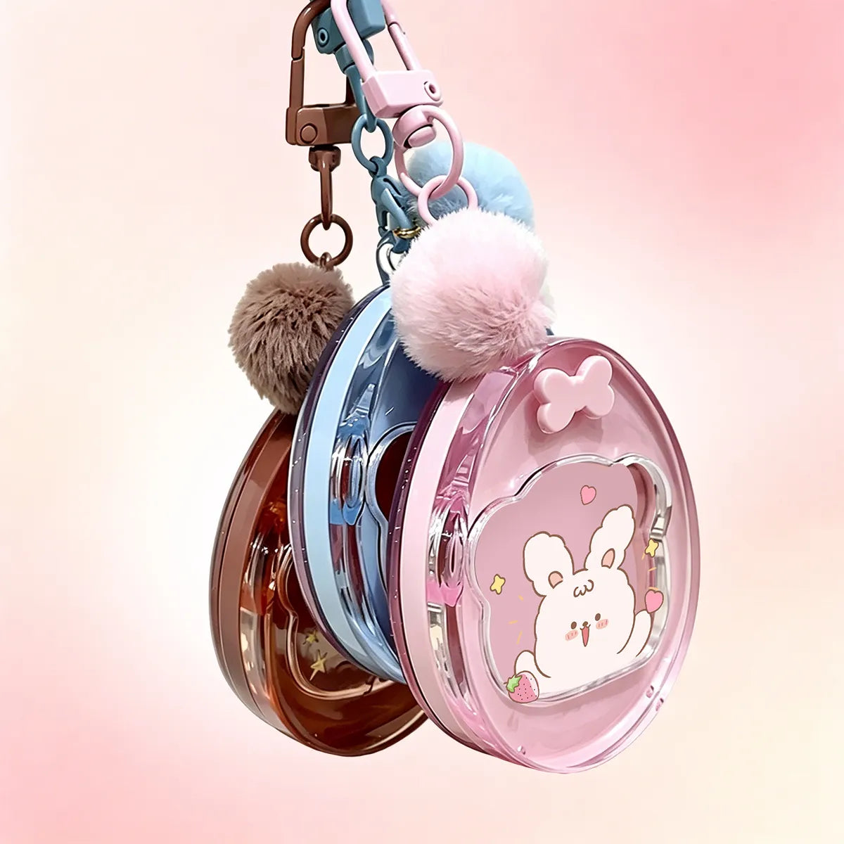 Cute round blush container with keychain design for portable carry, featuring a compact case style for on-the-go use.
