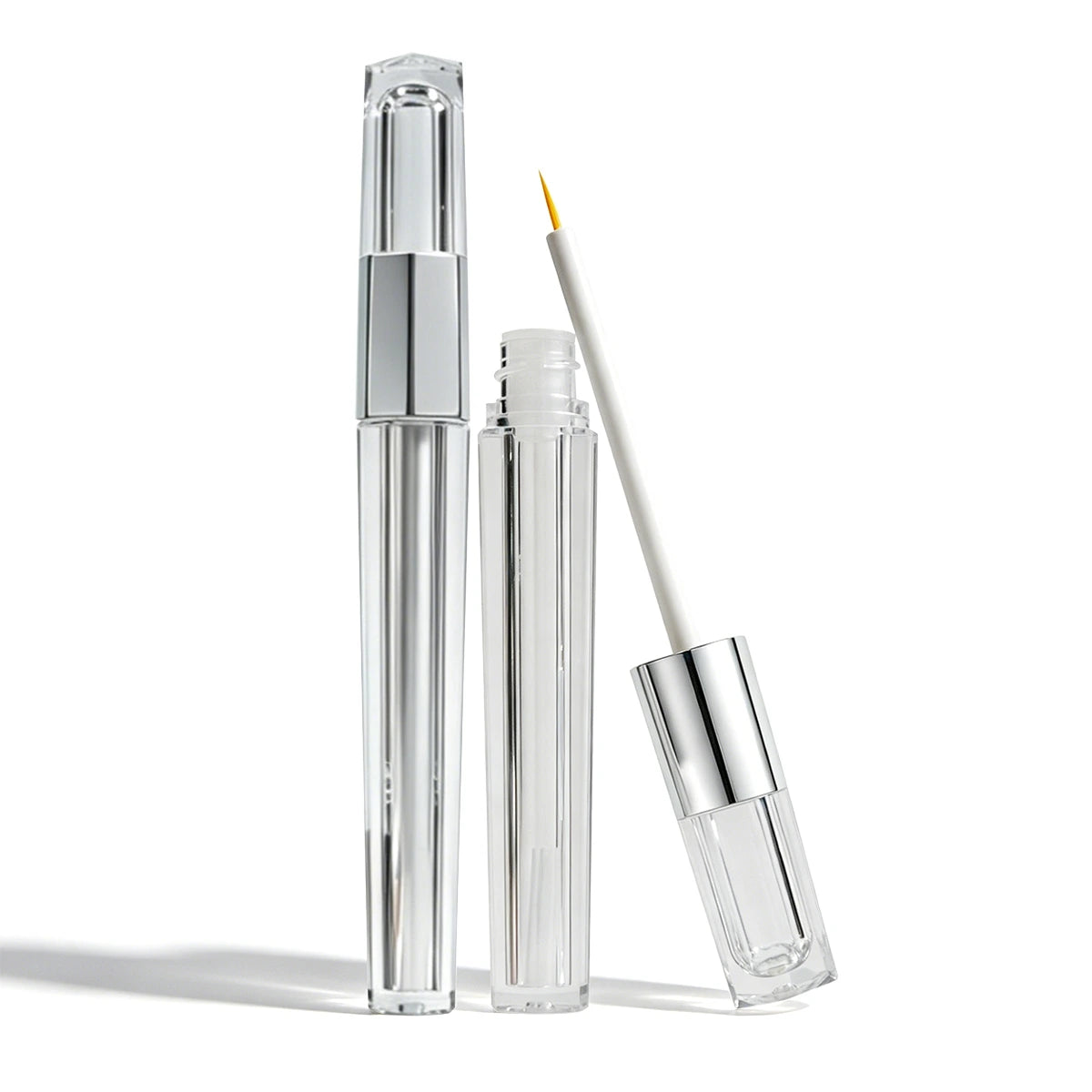 Clear and silver liquid eyeliner container with slim brush applicator, suitable for custom liquid eyeliner packaging and premium eye makeup packaging projects.