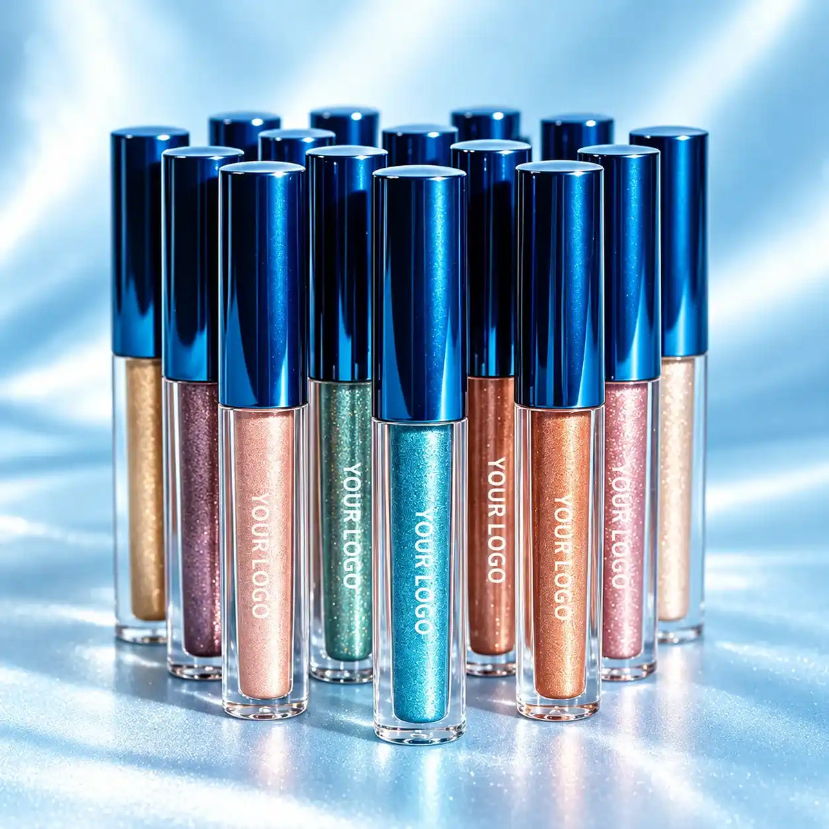 Liquid highlighters for wholesale supply in assorted shimmer colors, with blue caps and YOUR LOGO labels.