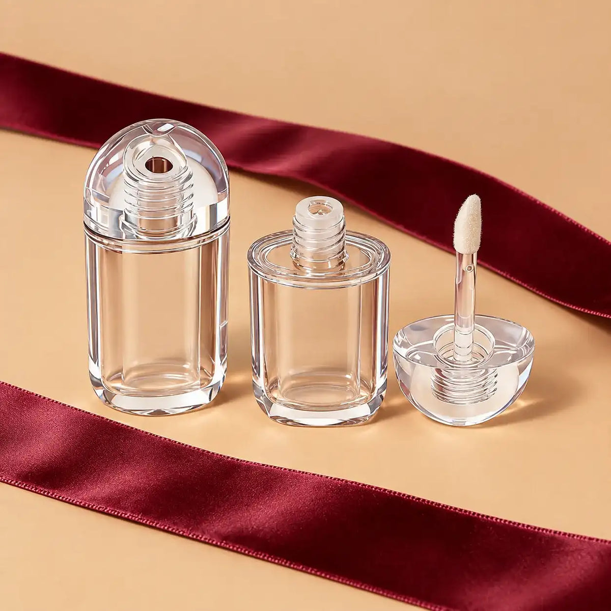 Kaiya clear PETG custom lip gloss tubes with matching transparent caps and a flocked applicator