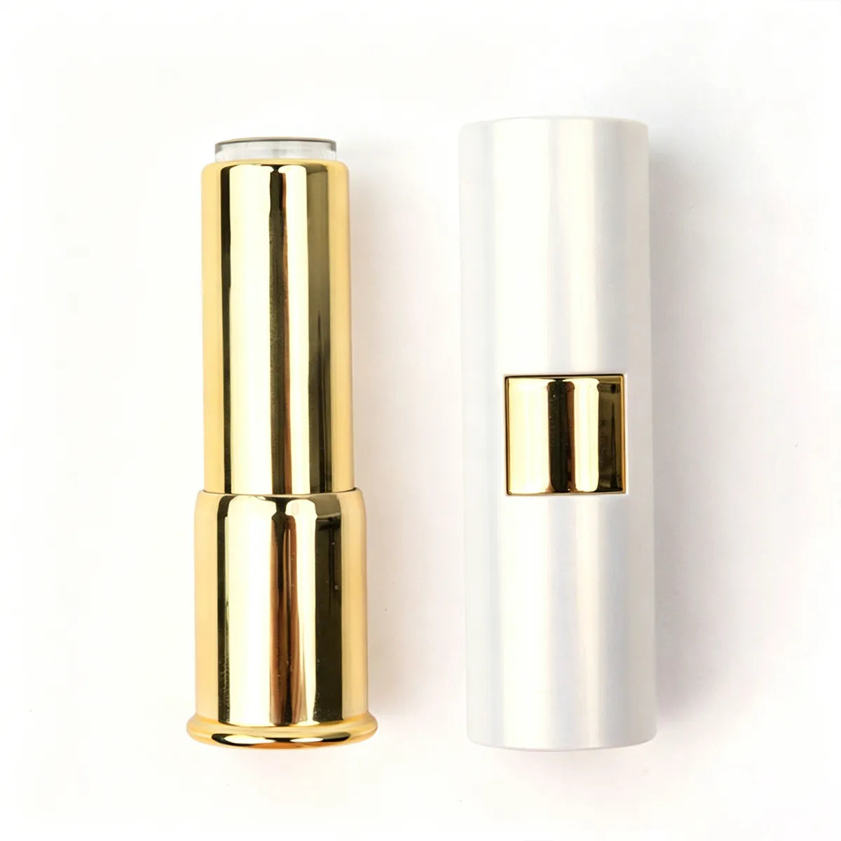Plastic lipstick tubes in gold and white design by Kaiya