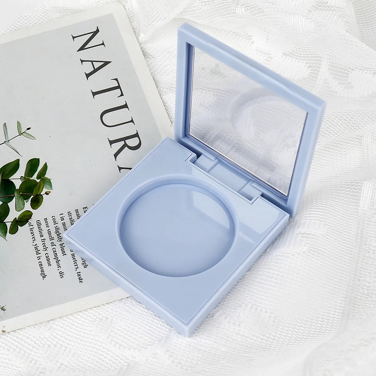 Kaiya pressed powder compact case in a magnetic square design with mirror for empty pressed powder packaging.