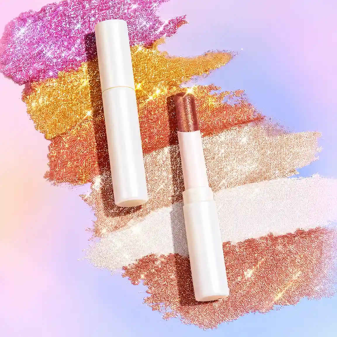 Private label highlighter makeup in white stick tubes with pink, gold, copper and champagne pearlescent swatches.