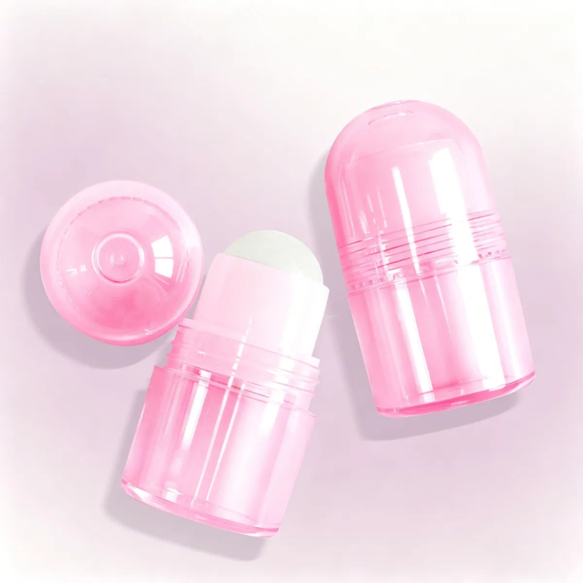KAIYA roll on bottles in pink transparent design for shimmer, body glow, lip oil or liquid makeup products