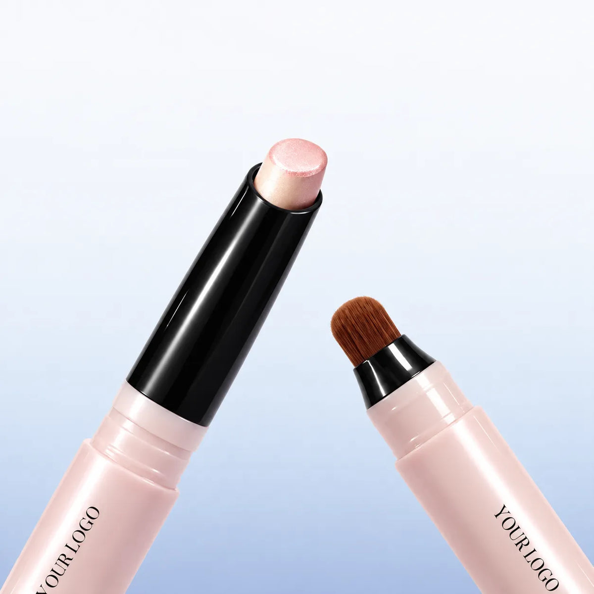 KAIYA dual-ended shimmer eyeshadow stick with a pale pink cream tip, matching pink barrel and a blending brush.