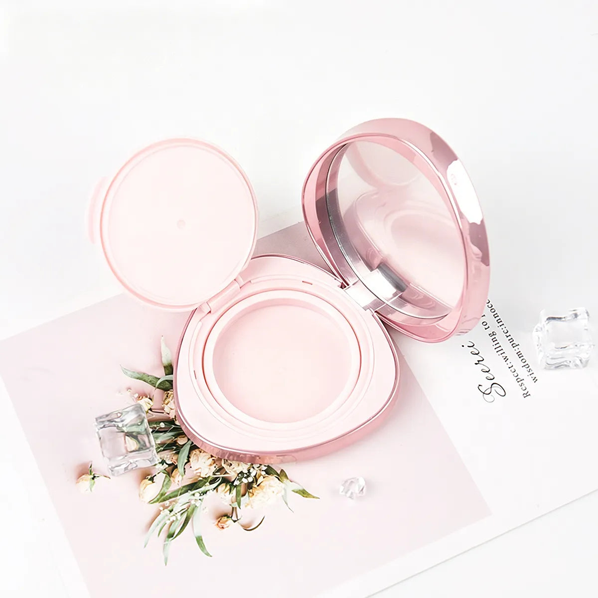 Magnetic cushion foundation container in a translucent pink round case with mirror and sponge space for Kaiya empty cushion compact projects.