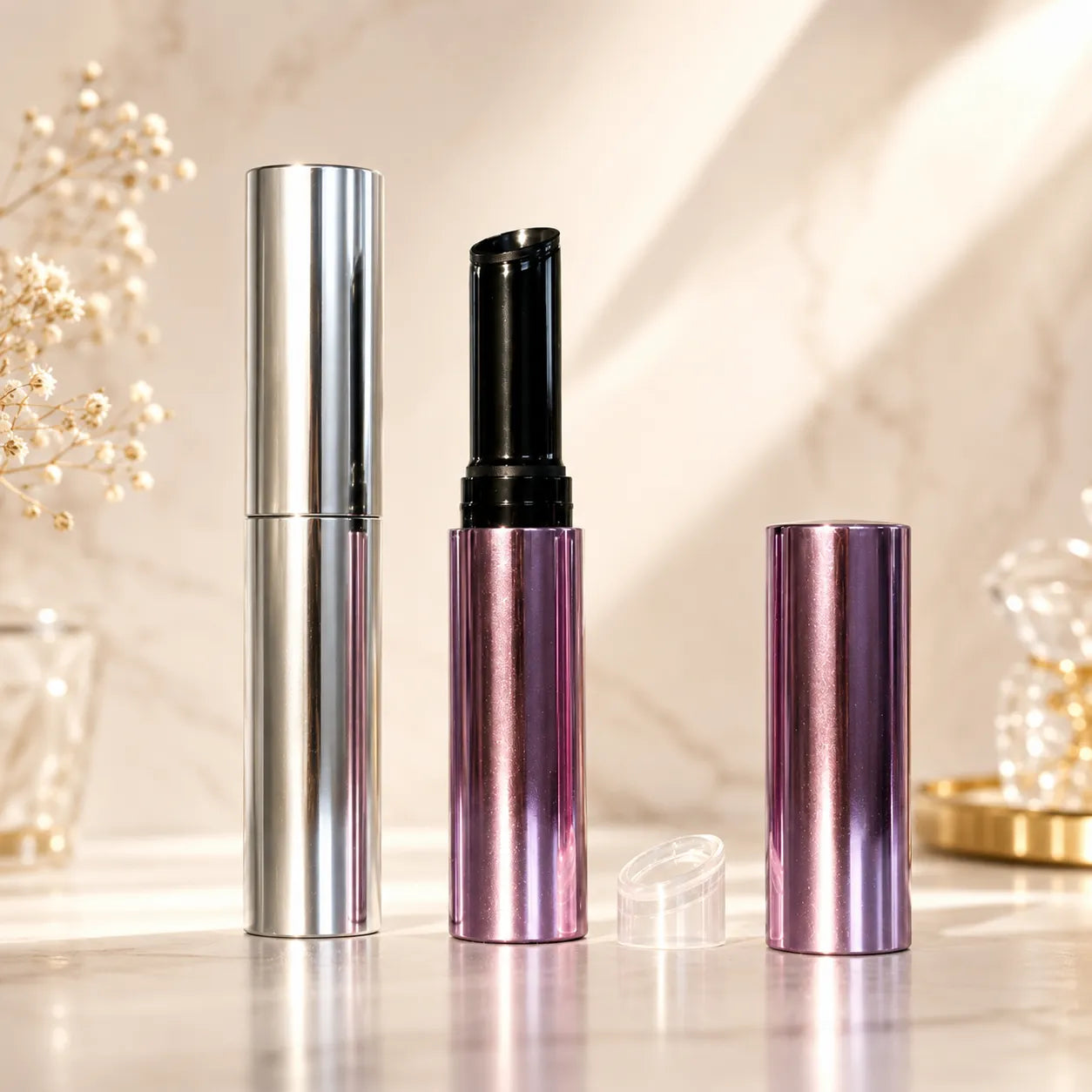 Aluminum lip balm tube with pink and silver metal packaging, removable cap, and premium empty lip balm container design