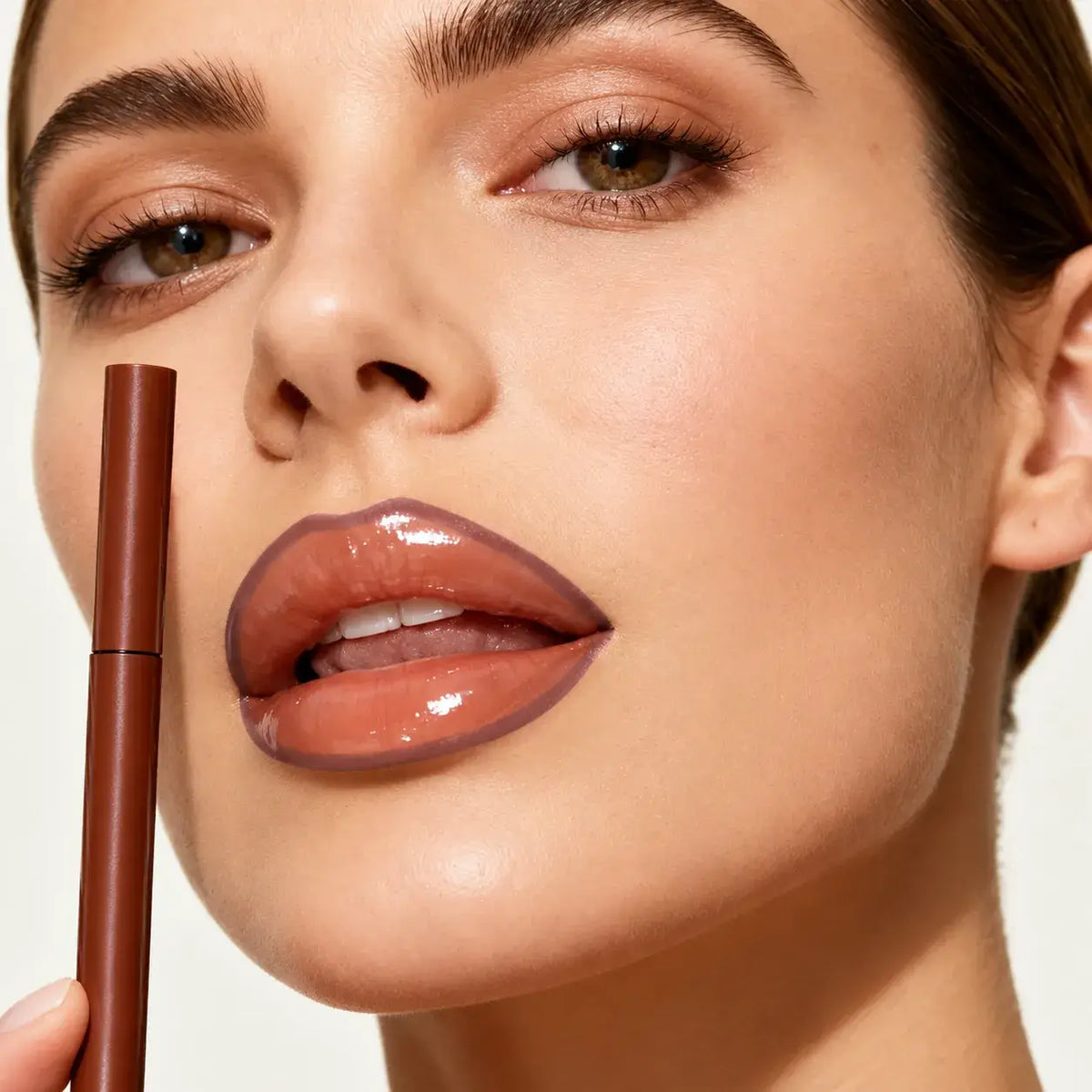 Kaiya brown lip liner wholesale formula showing smooth glide, defined lip contour and a glossy coordinated lip look.