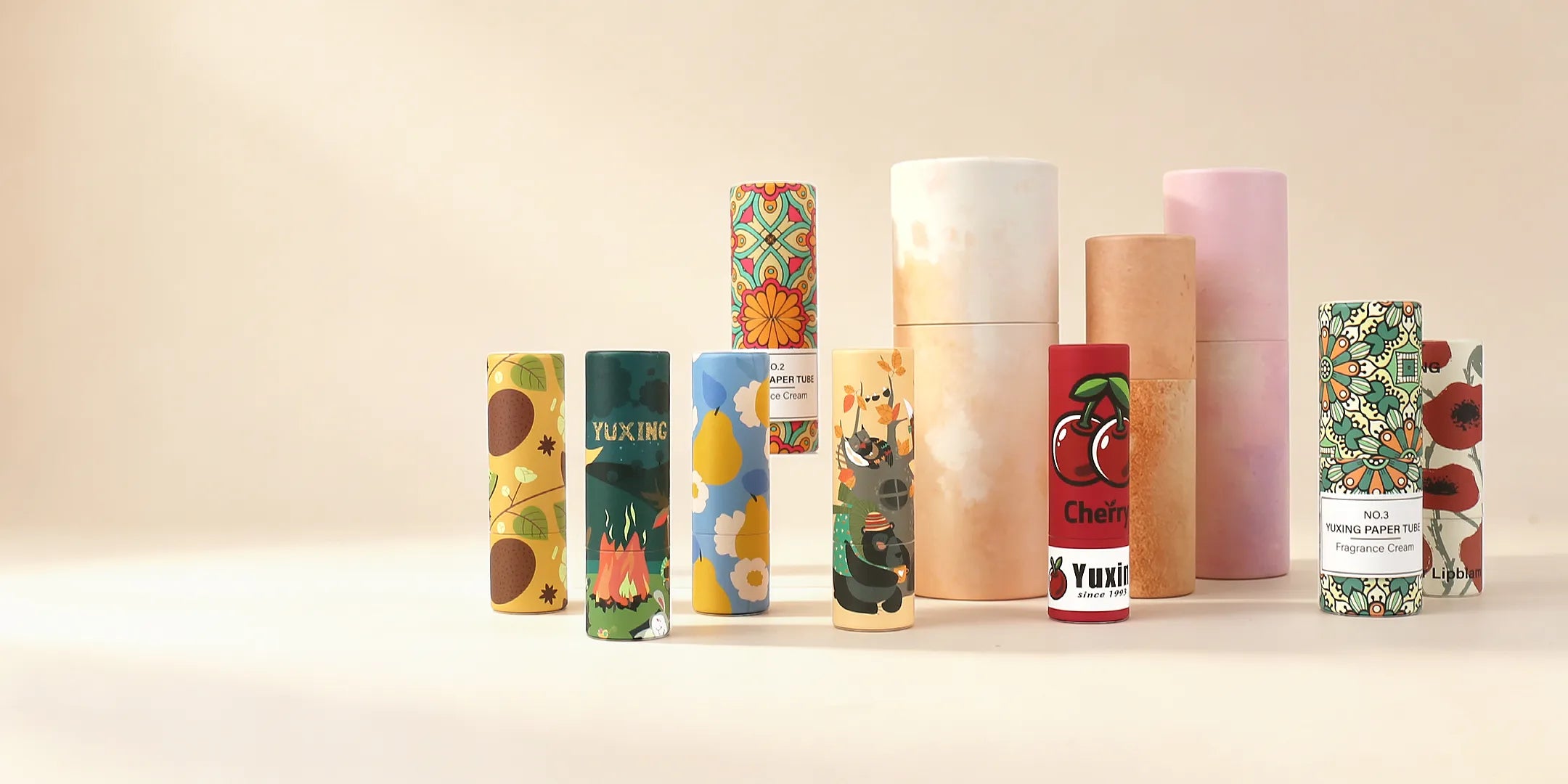 Kaiya cardboard lip balm tubes bulk collection with assorted printed paper lip balm tubes for wholesale packaging projects.