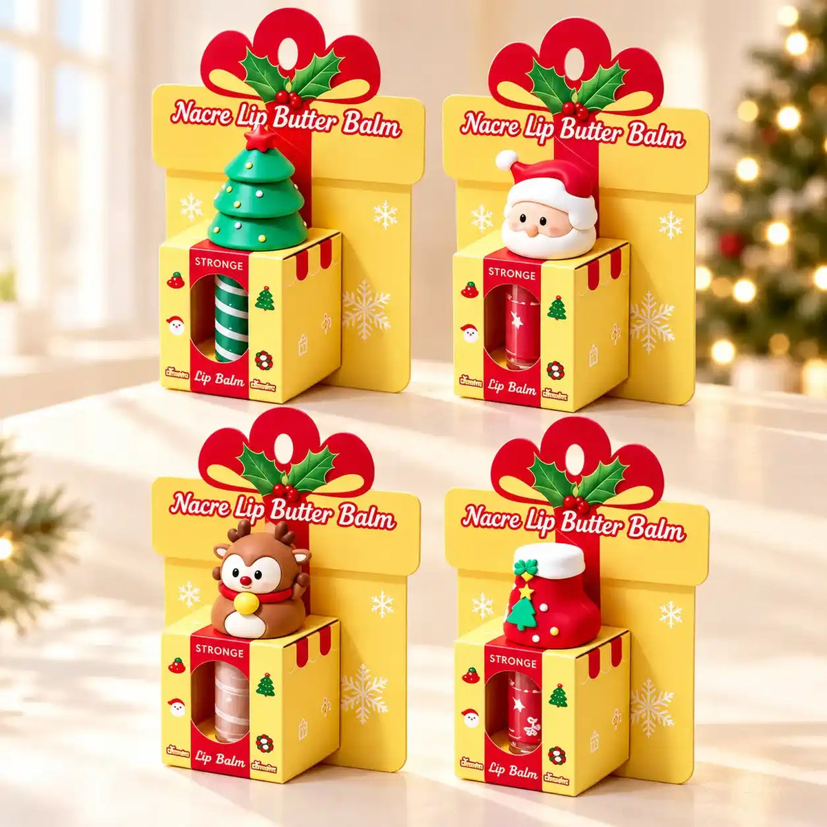 Four Christmas lip gloss designs in yellow gift-box-style packs with red bow motifs and character caps.