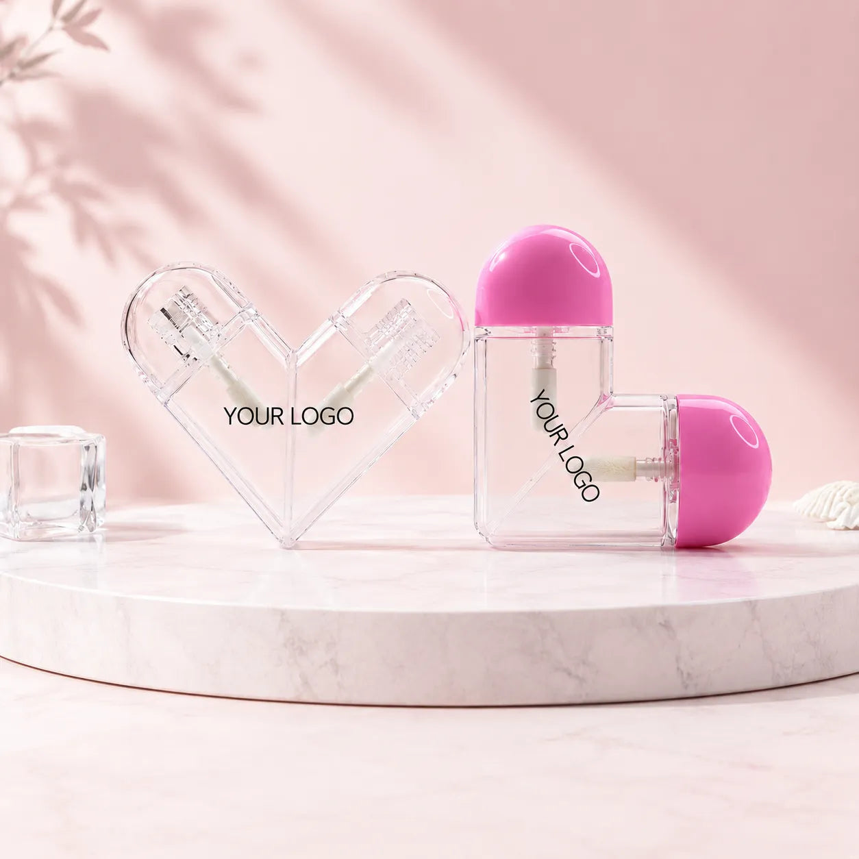 
Kaiya clear lip gloss containers with heart shape design for transparent cosmetic packaging.
