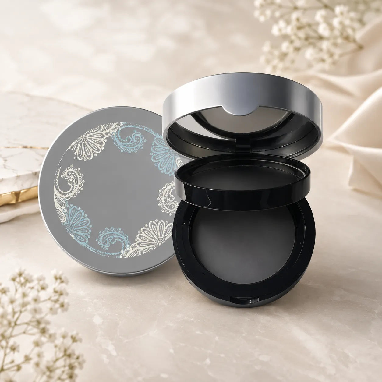Kaiya compact powder container in a round design with mirror lid and decorative cover for empty pressed powder packaging.