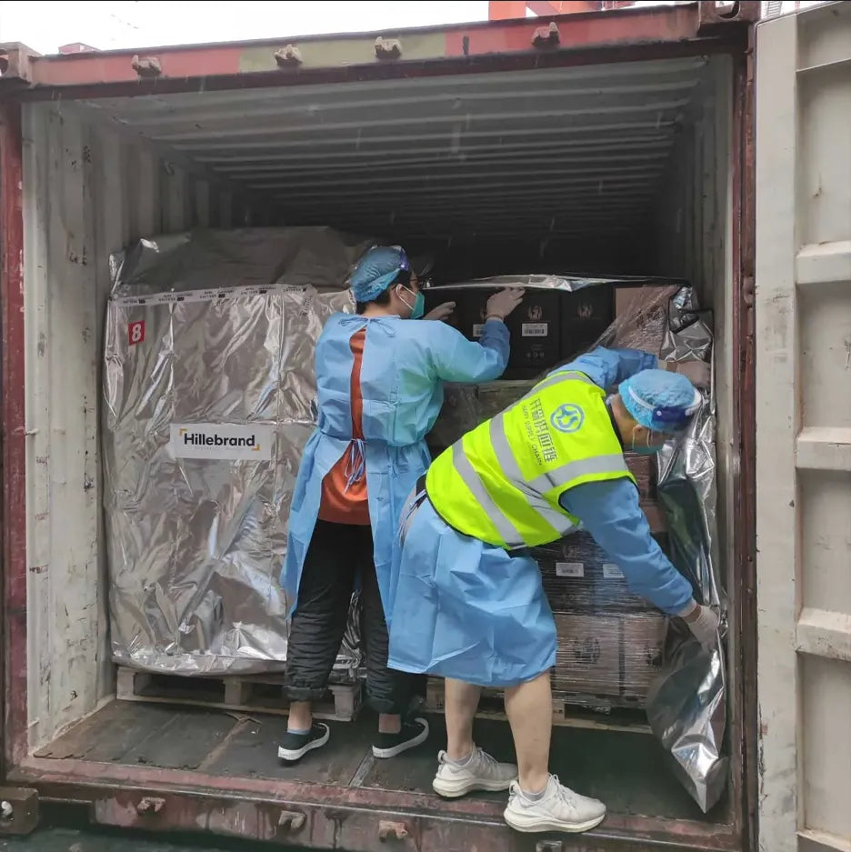 Cosmetic factory team handling raw material sourcing and incoming inspection as part of cosmetics manufacturing by a professional cosmetic manufacturer.