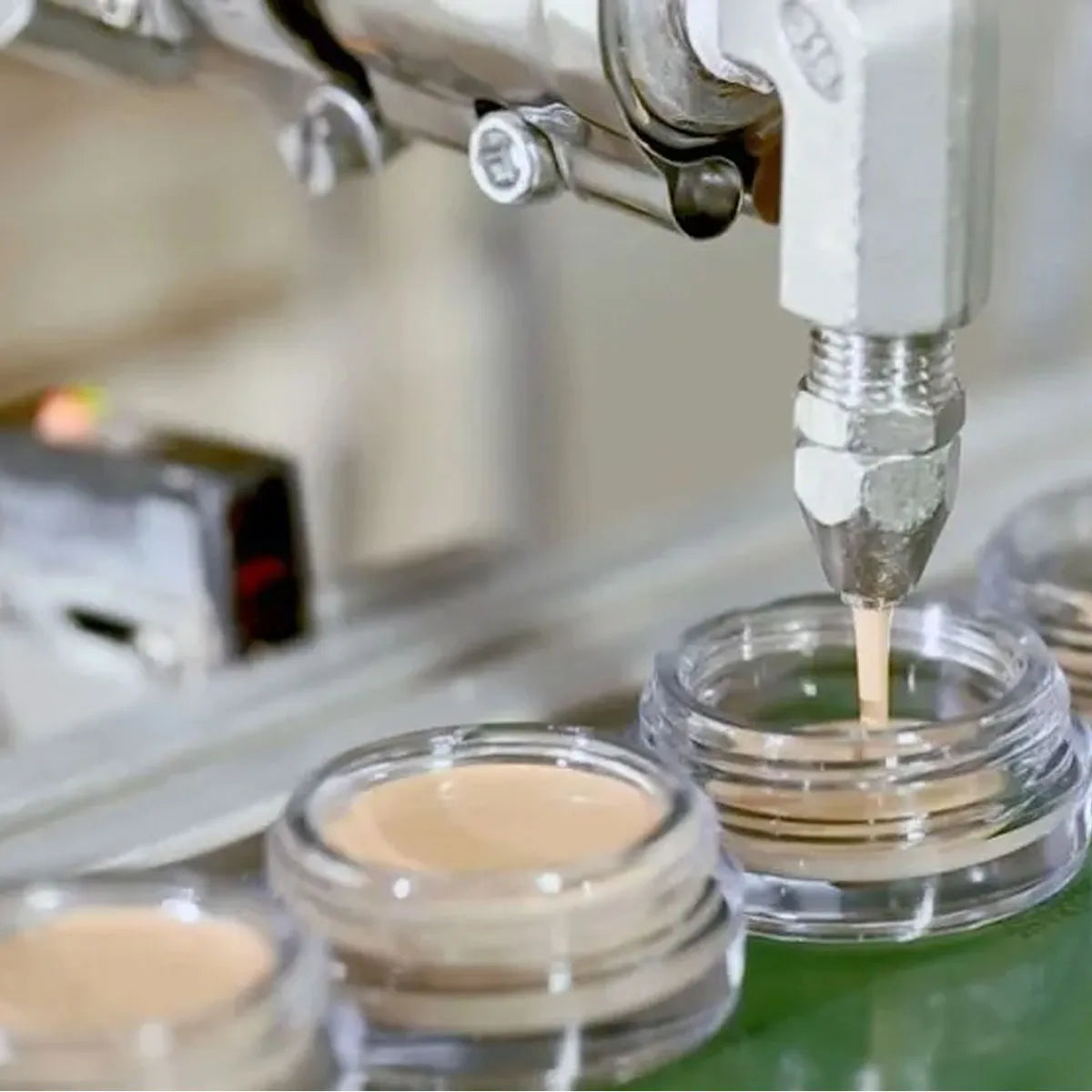 Cosmetic products manufacturer KAIYA showing cream makeup filling equipment for finished color makeup production.