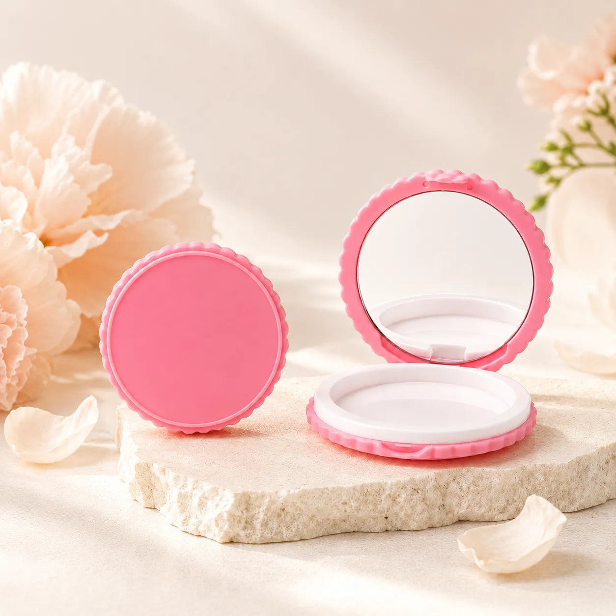 Creative cosmetic packaging by KAIYA, showing a pink round compact case with mirror in a refined beauty display.