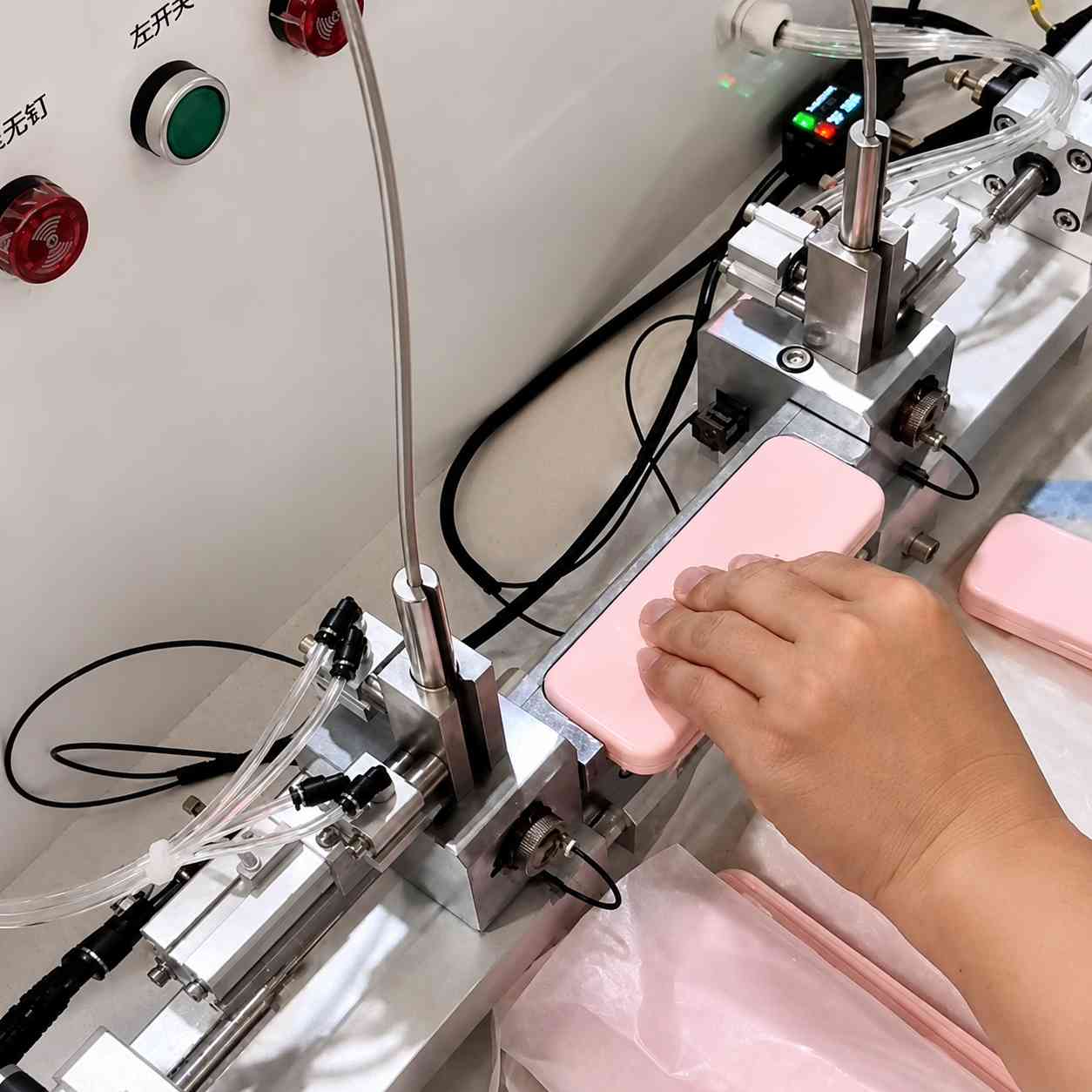 Custom cosmetic packaging manufacturers by KAIYA, showing pink cosmetic packaging components processed with production equipment.