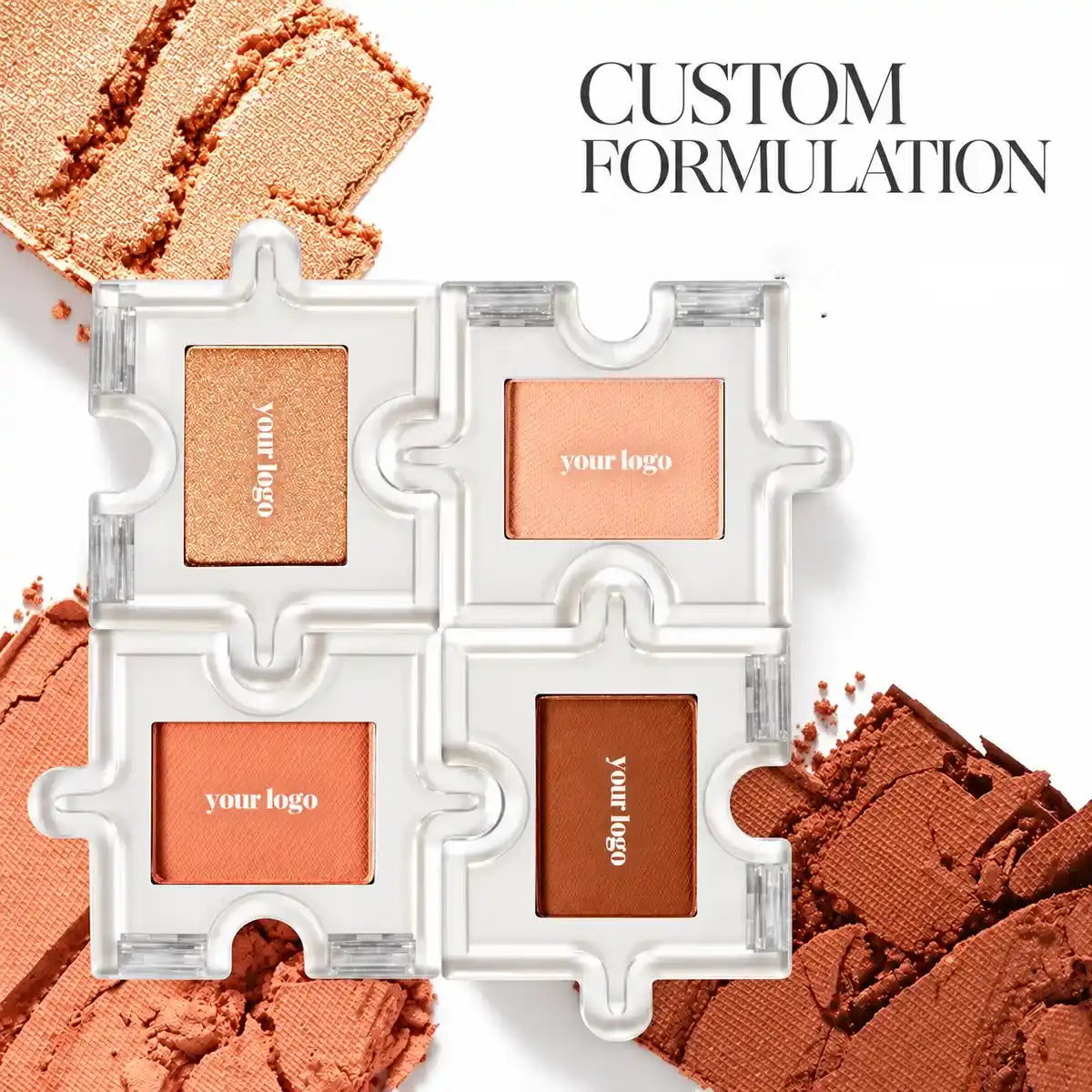 KAIYA custom eyeshadow palette formed from four interlocking clear single compacts in champagne, peach, orange and brown.