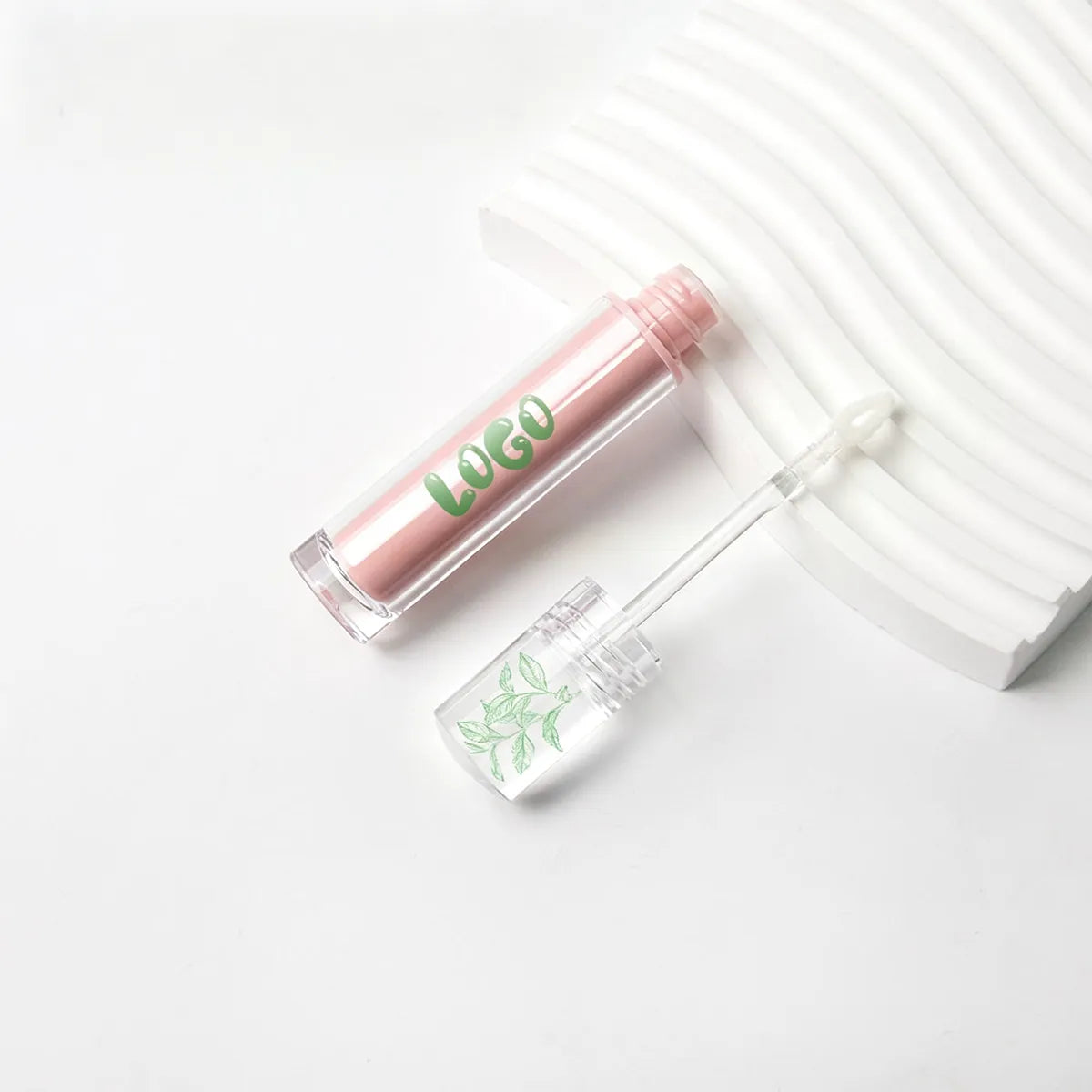 Custom lip gloss tubes by KAIYA, featuring clear empty plastic lip gloss tube packaging for cosmetic brands.