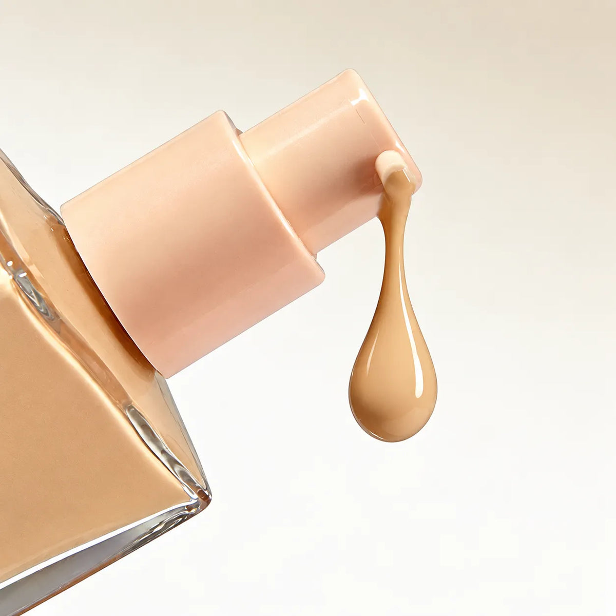 Custom liquid foundation with lightweight fluid texture developed for smooth spread, comfortable skin feel and buildable application by KAIYA
