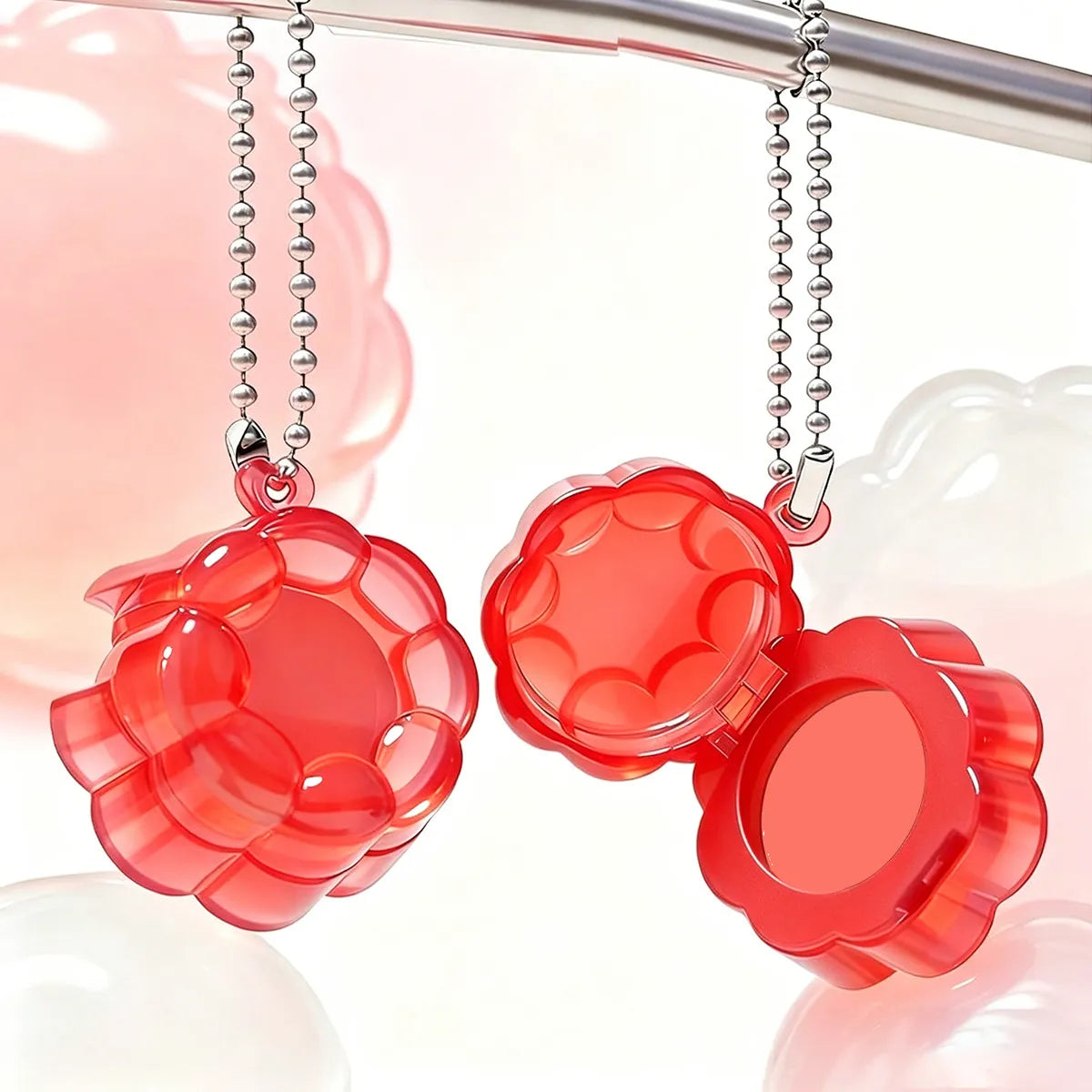 Kaiya cute blush packaging with hanging charm chain design and flower-shaped compact case for novelty blush product lines.