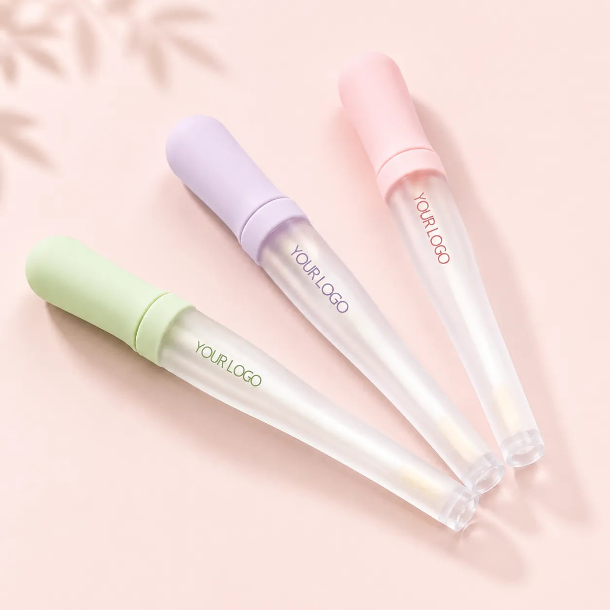 Kaiya empty clear mascara bottle with pastel caps for custom eye makeup packaging.