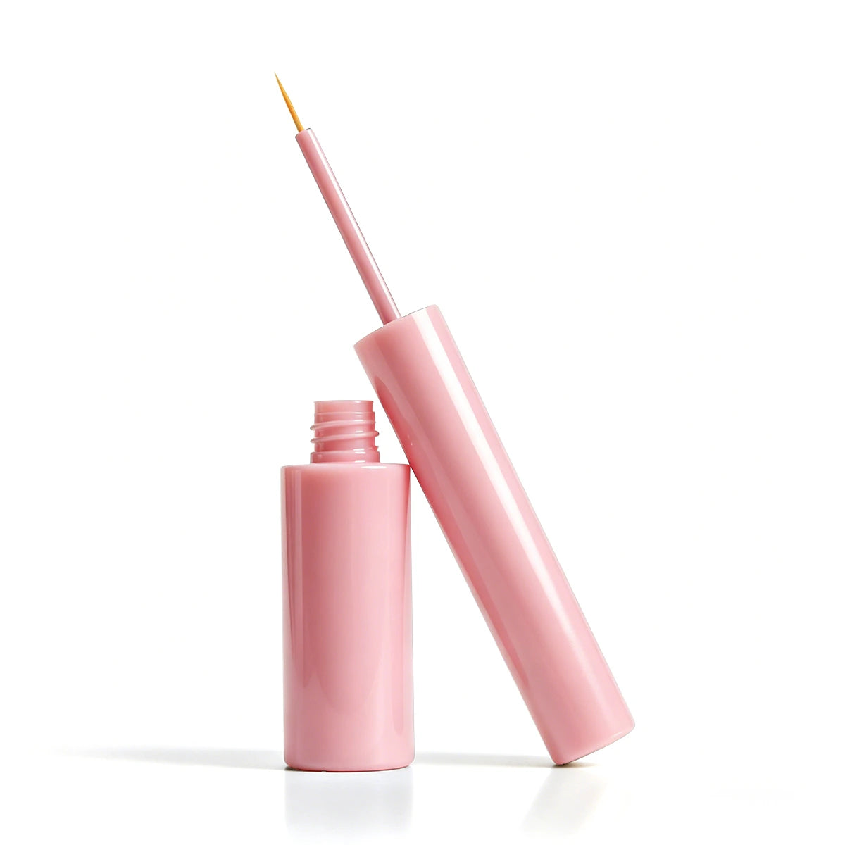 Pink empty eyeliner containers with slim brush applicator, suitable for custom liquid eyeliner bottle projects and cute eye makeup packaging.