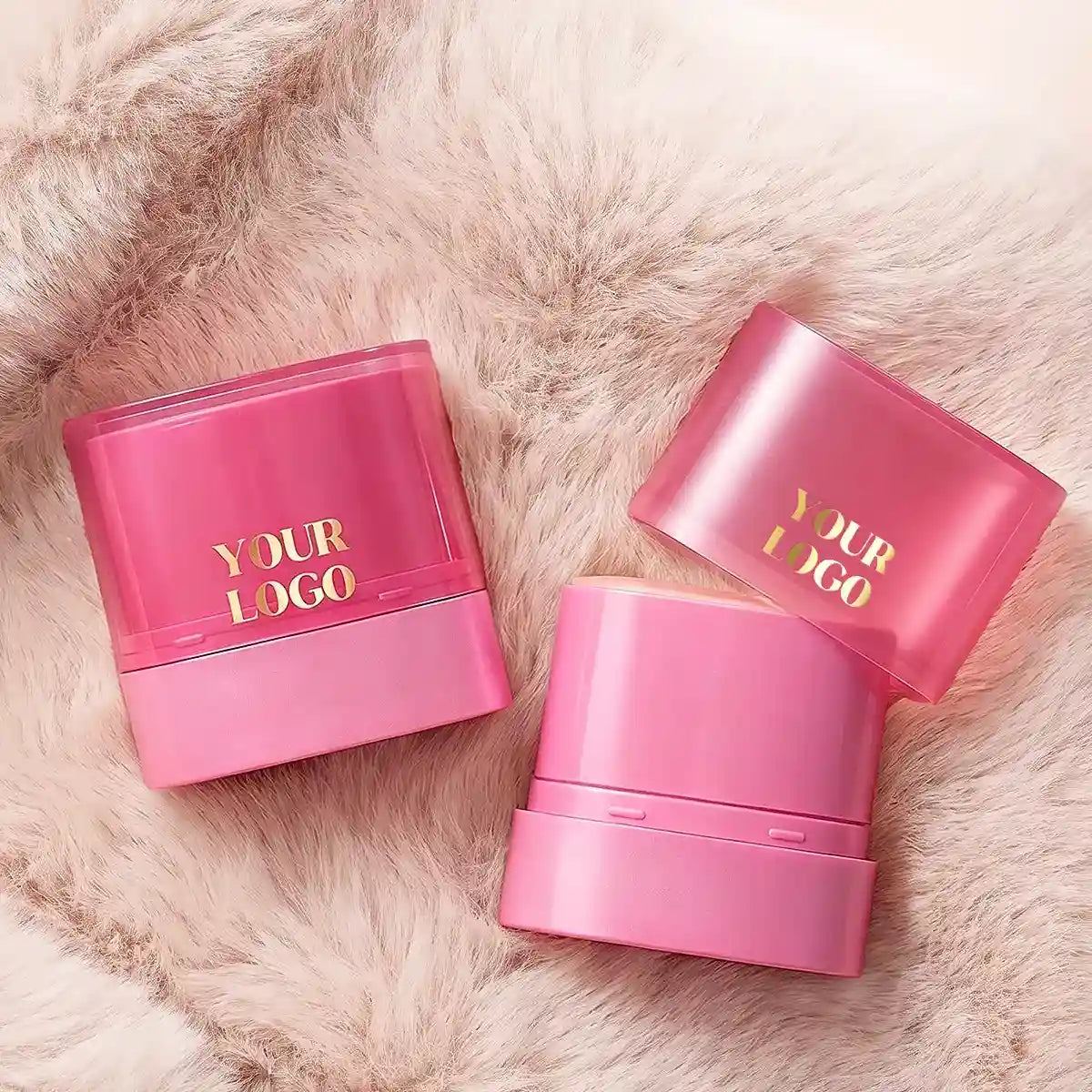 Kaiya empty foundation stick container and cream blush packaging with gold hot stamping logo decoration on pink cosmetic sticks.