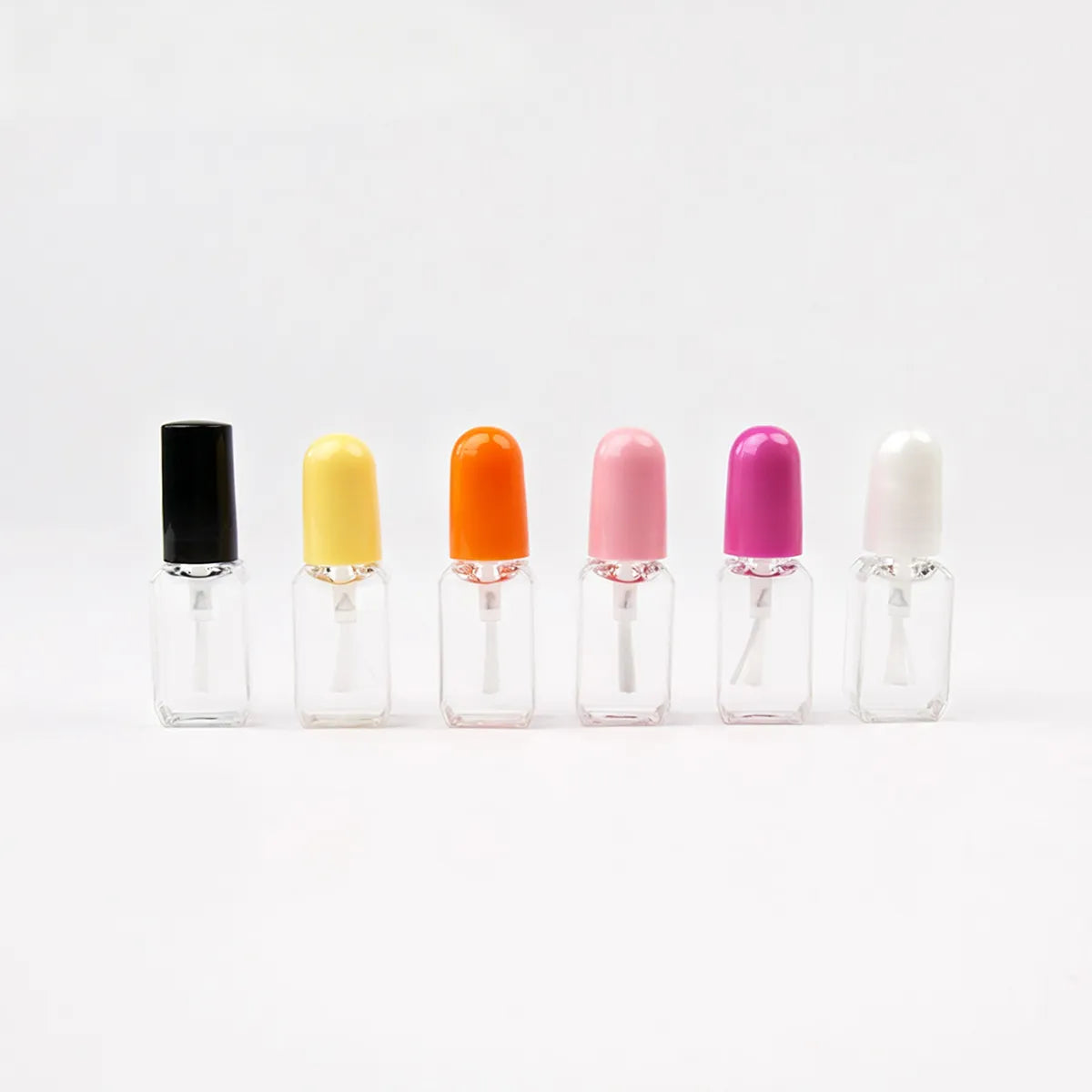 Kaiya empty square nail polish bottles in multiple cap colors
