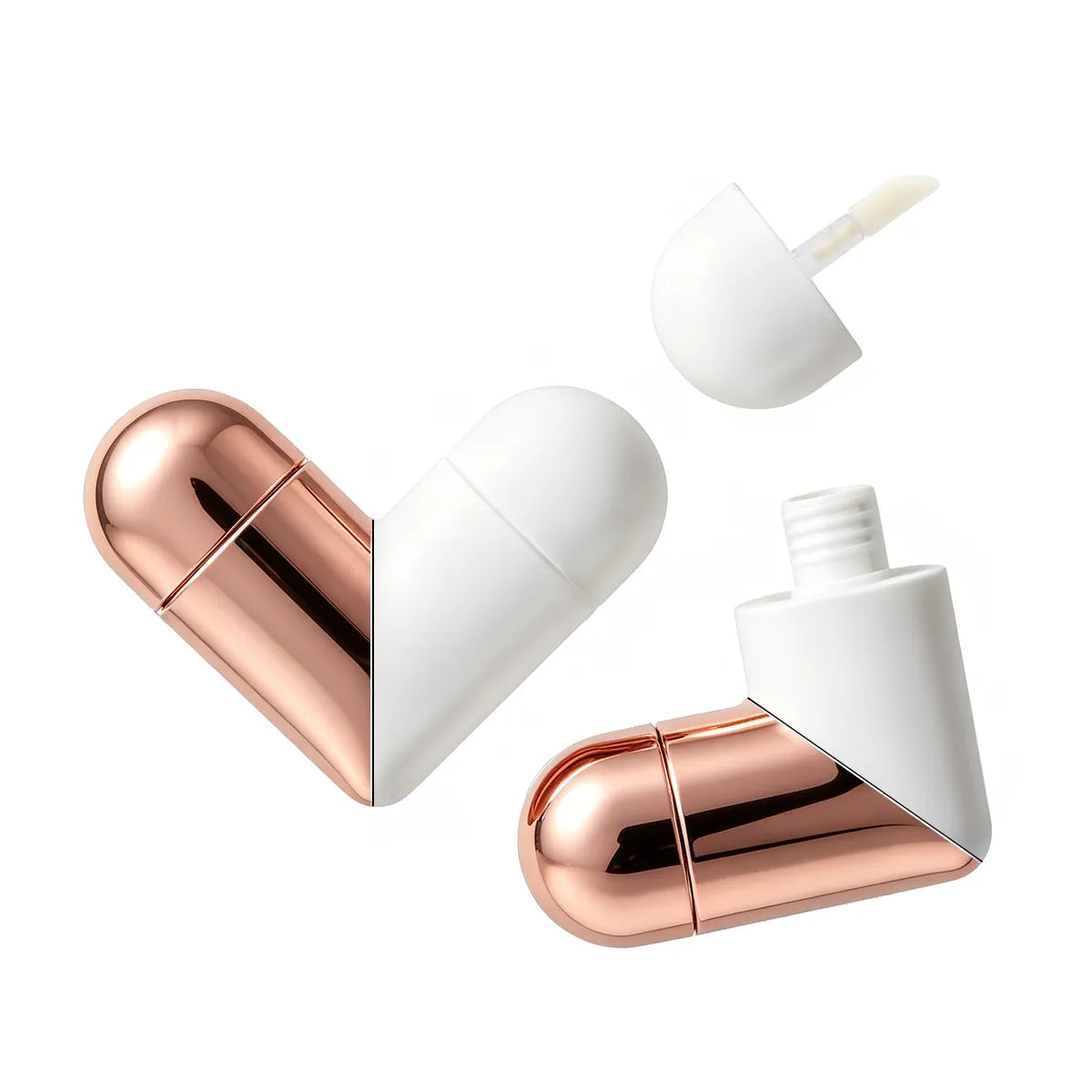 Kaiya heart shaped lip gloss tubes with rose gold vacuum metallized finish for decorative cosmetic packaging.