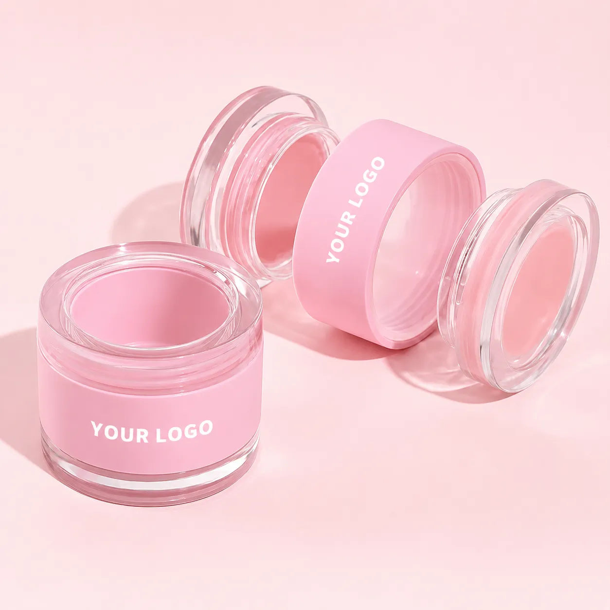 Kaiya pink lip scrub bottles with dual-compartment packaging for empty lip scrub and lip mask containers.