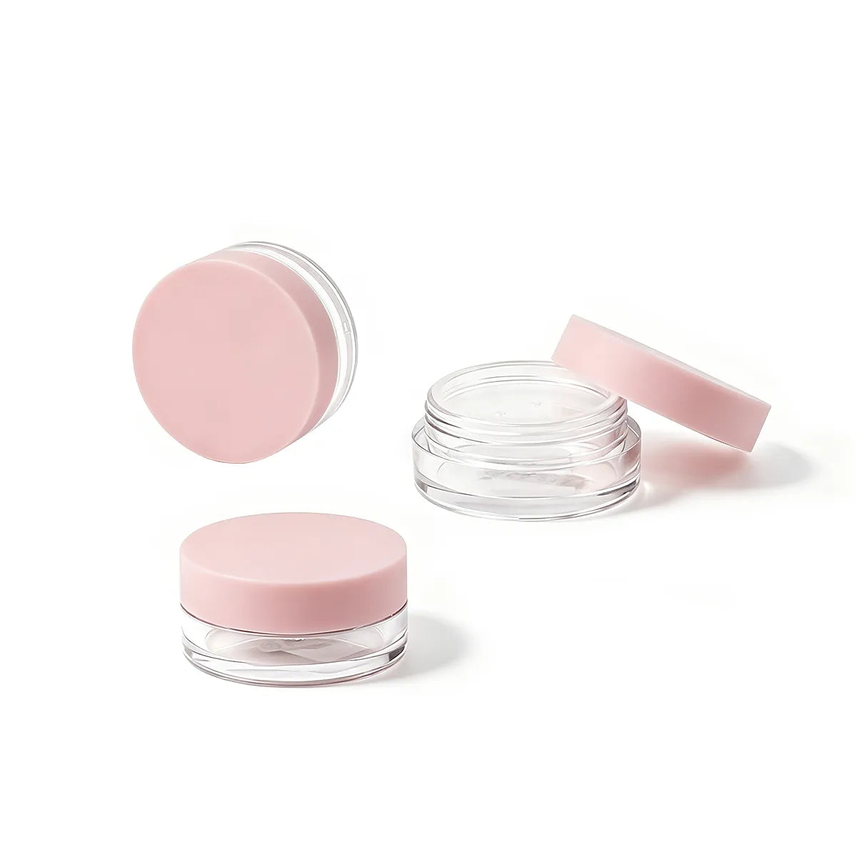 Mini loose powder container with a pink lid and clear jar design for Kaiya cosmetic packaging and portable makeup products.