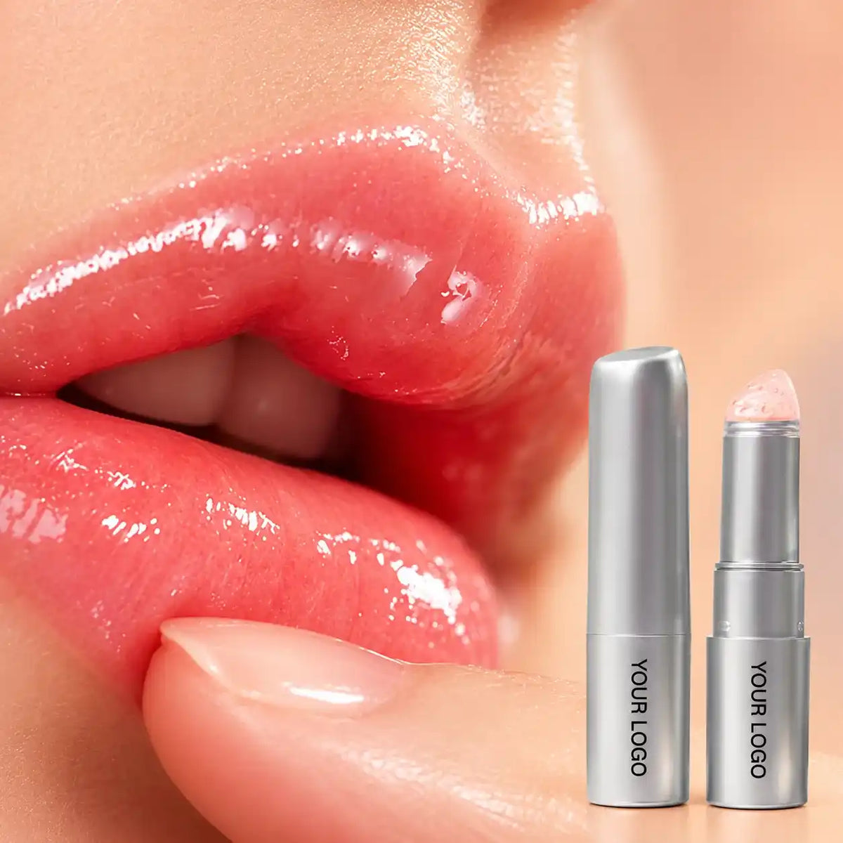Plumping lip balm stick in silver tubes, shown beside lips with a glossy coral finish.