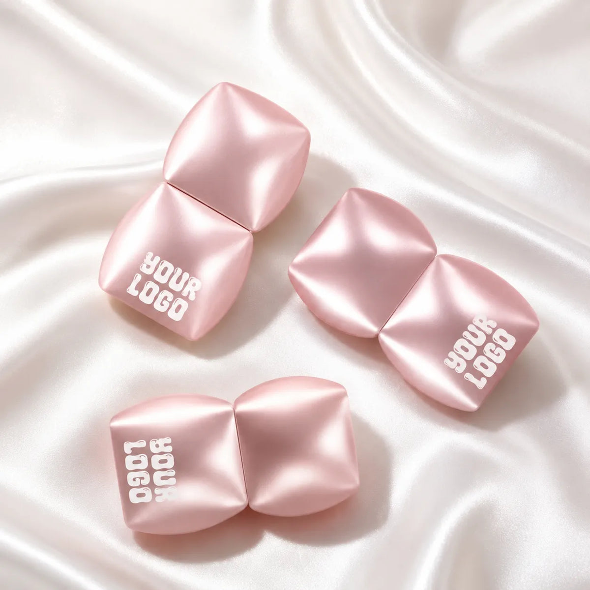 Rose gold lip gloss containers with a sculpted bow-inspired shape and custom your logo