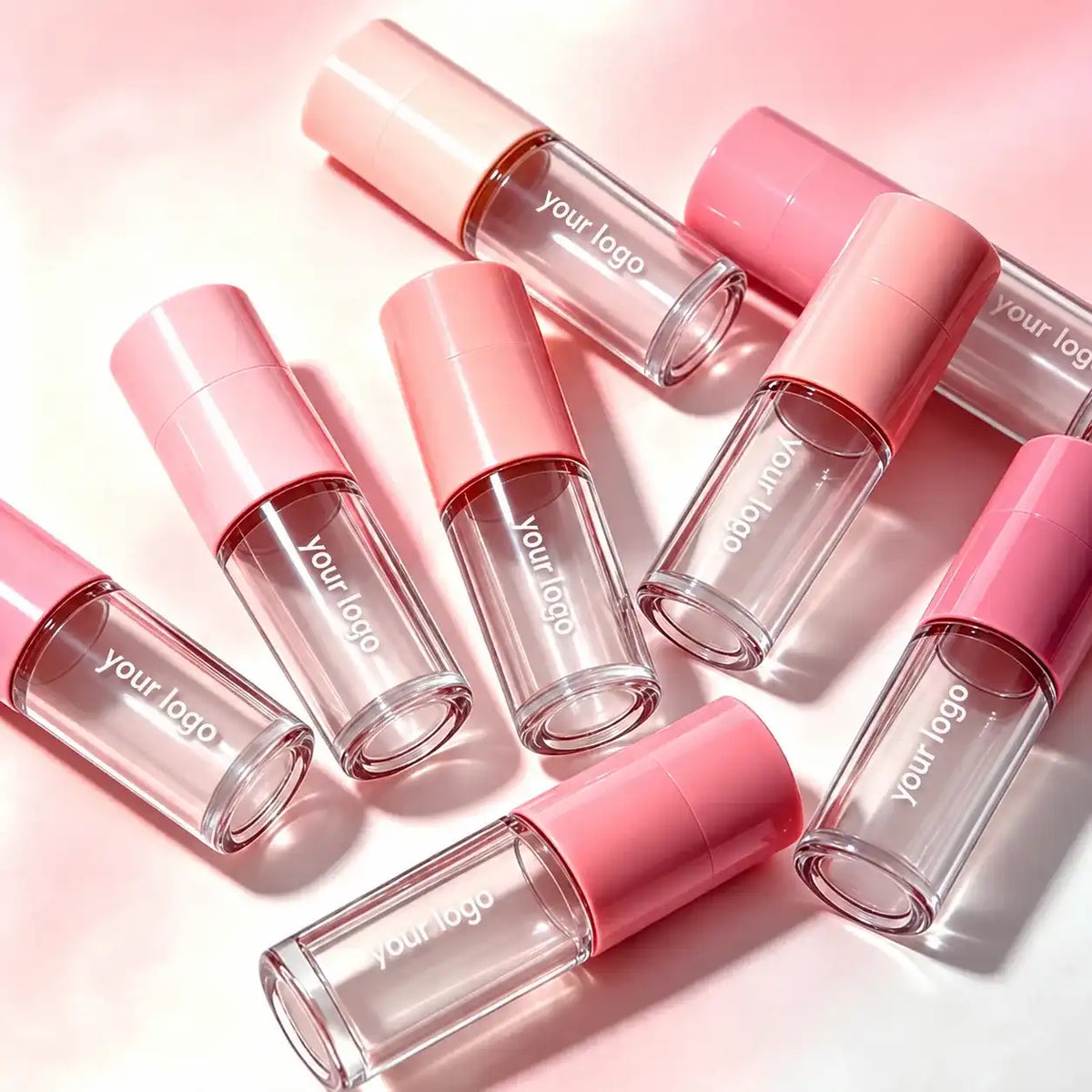 small lip gloss containers wholesale in clear pink design with custom logo options