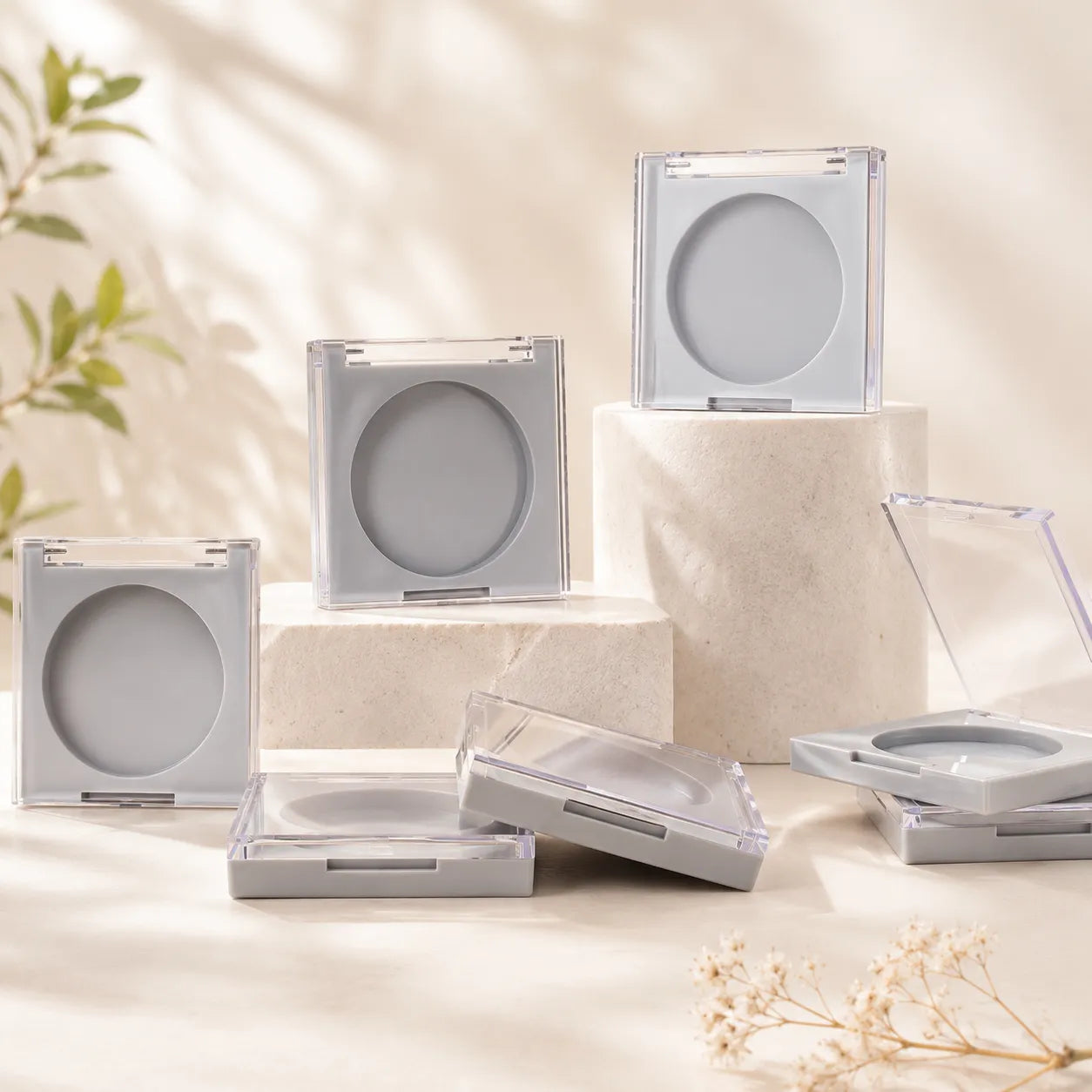 Kaiya square compact powder case collection with clear lids and empty pans for pressed powder packaging projects.