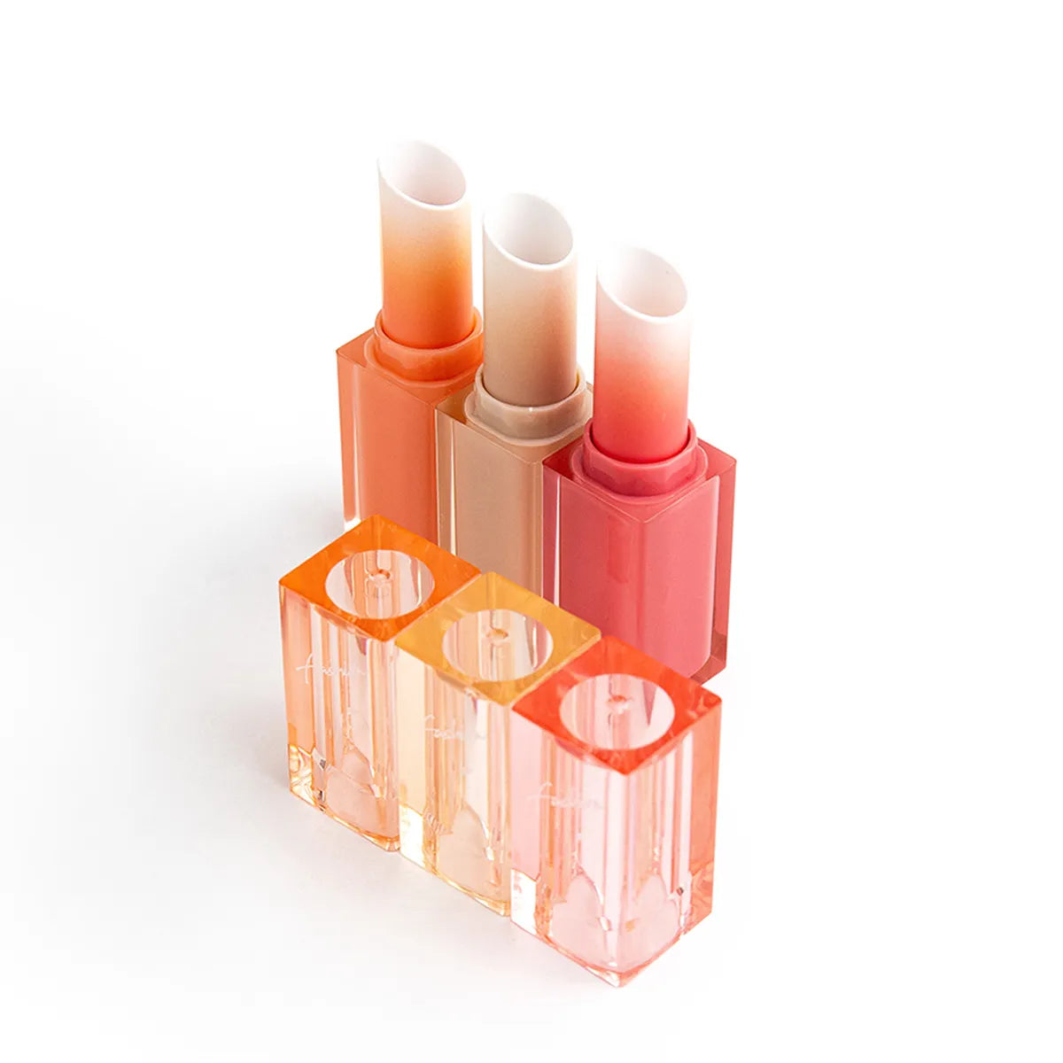 Square Lipstick Tube with transparent gradient caps and warm color options for custom lipstick packaging.