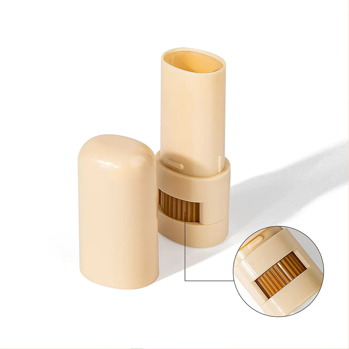 KAIYA twist-up stick container showing internal rotation structure for foundation stick packaging and cream makeup sticks